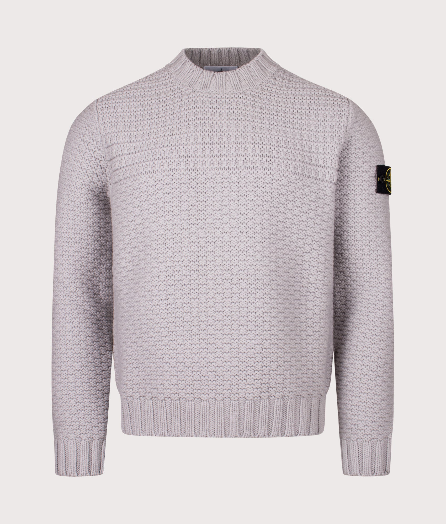 Mock Neck Wool Jumper in Pearl Grey. 100% Wool | Stone Island | Shot at EQVVS | Front shot 