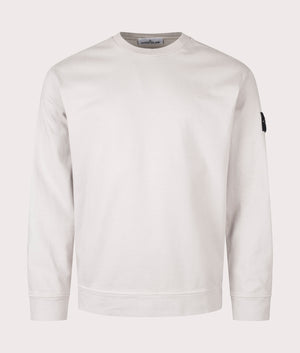 Stone Island Heavy Cotton Sweatshirt in Pearl Grey at EQVVS Menswear. Front shot.