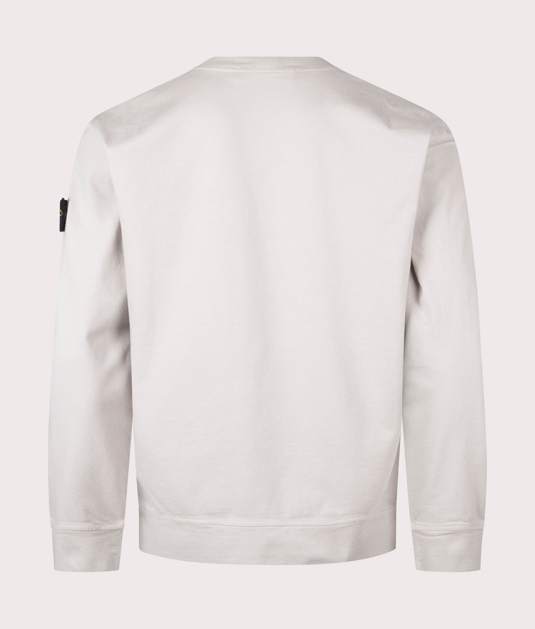 Stone Island Heavy Cotton Sweatshirt in Pearl Grey at EQVVS Menswear. Back shot.