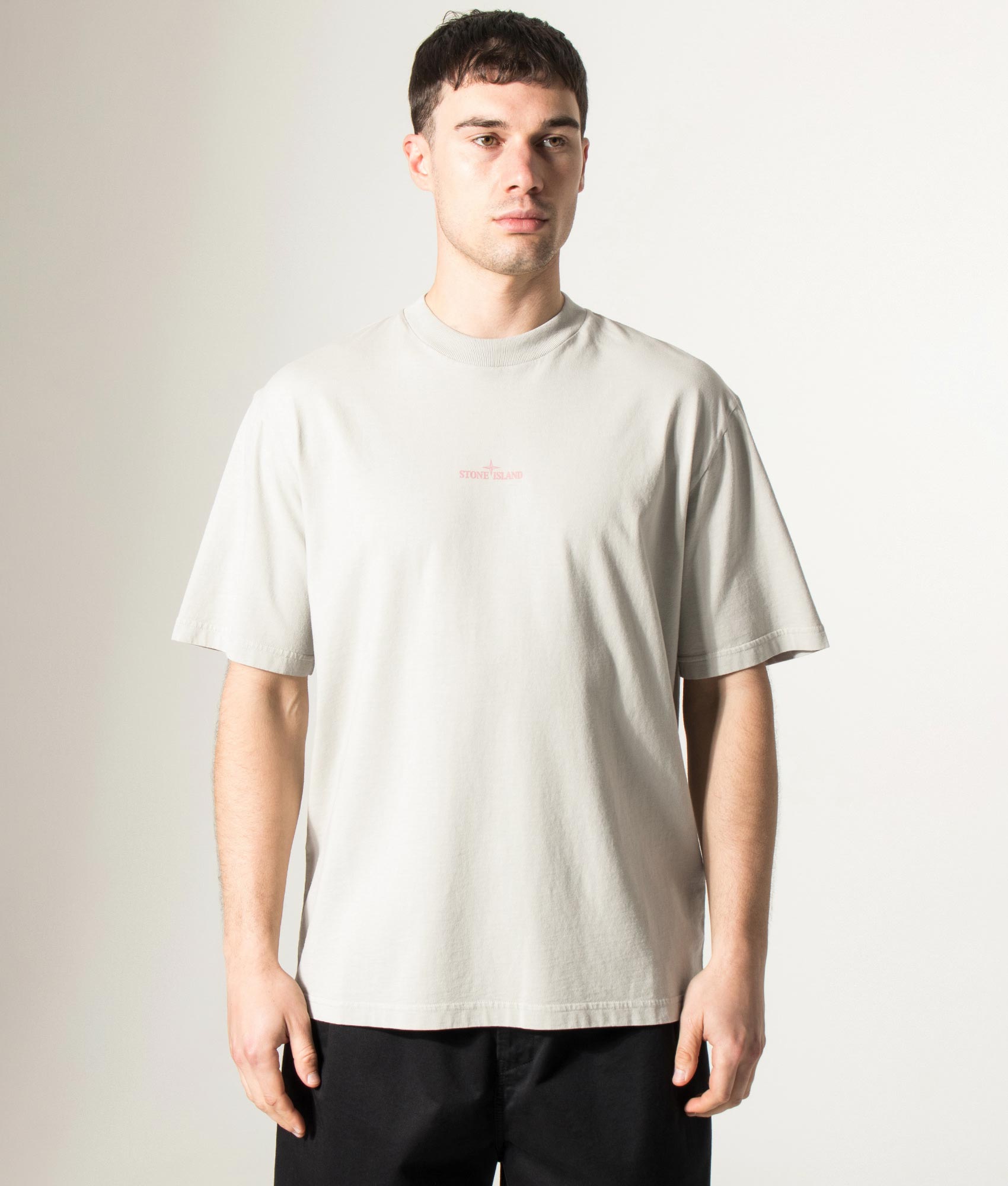 Stone island Carlo Rivetti T-Shirt in Pearl Grey at EQVVS Menswear. Model front shot.
