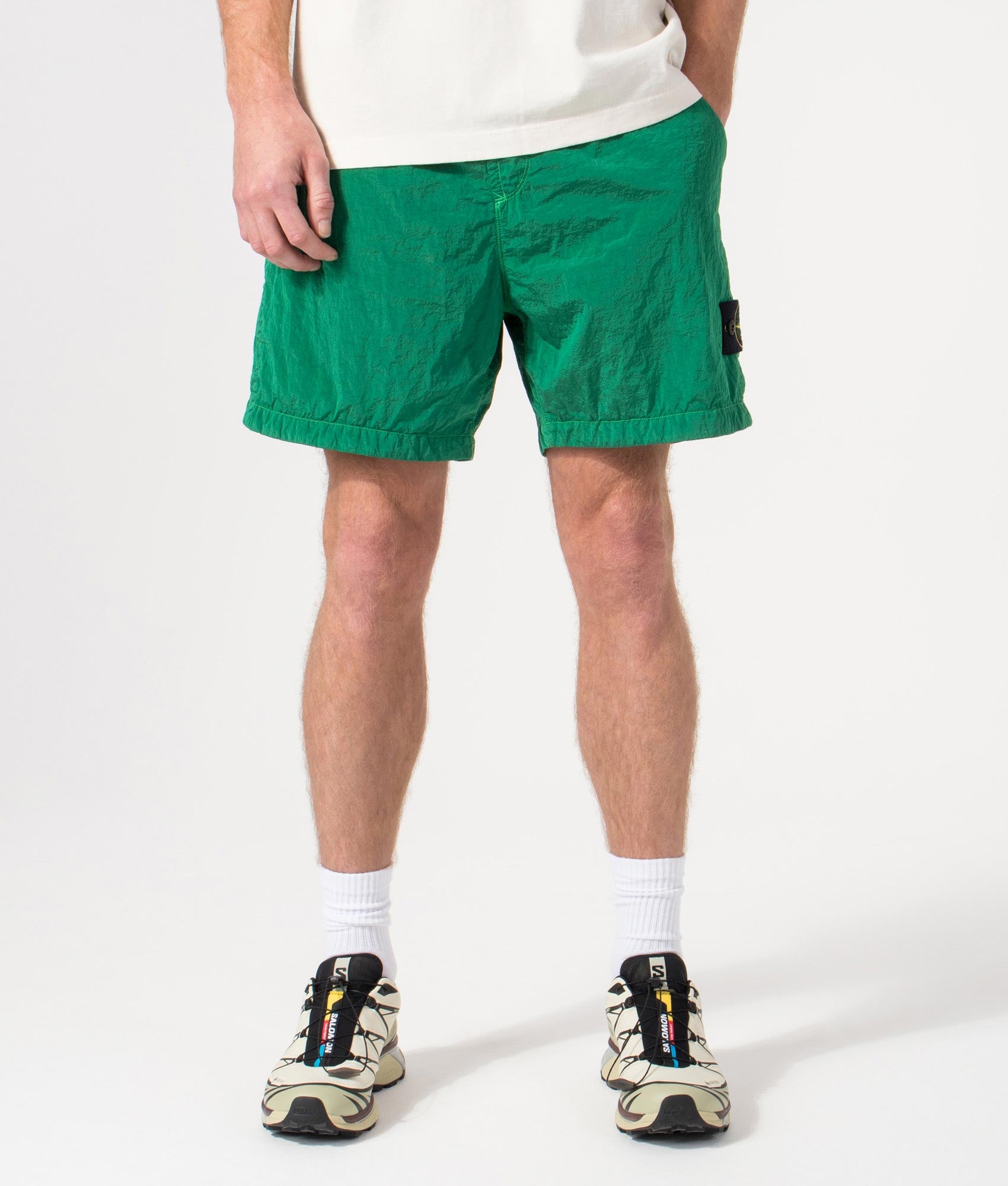 Regular Fit Compass Swim Shorts in Malachite by Stone Island. Shot by EQVVS. Front Shot.