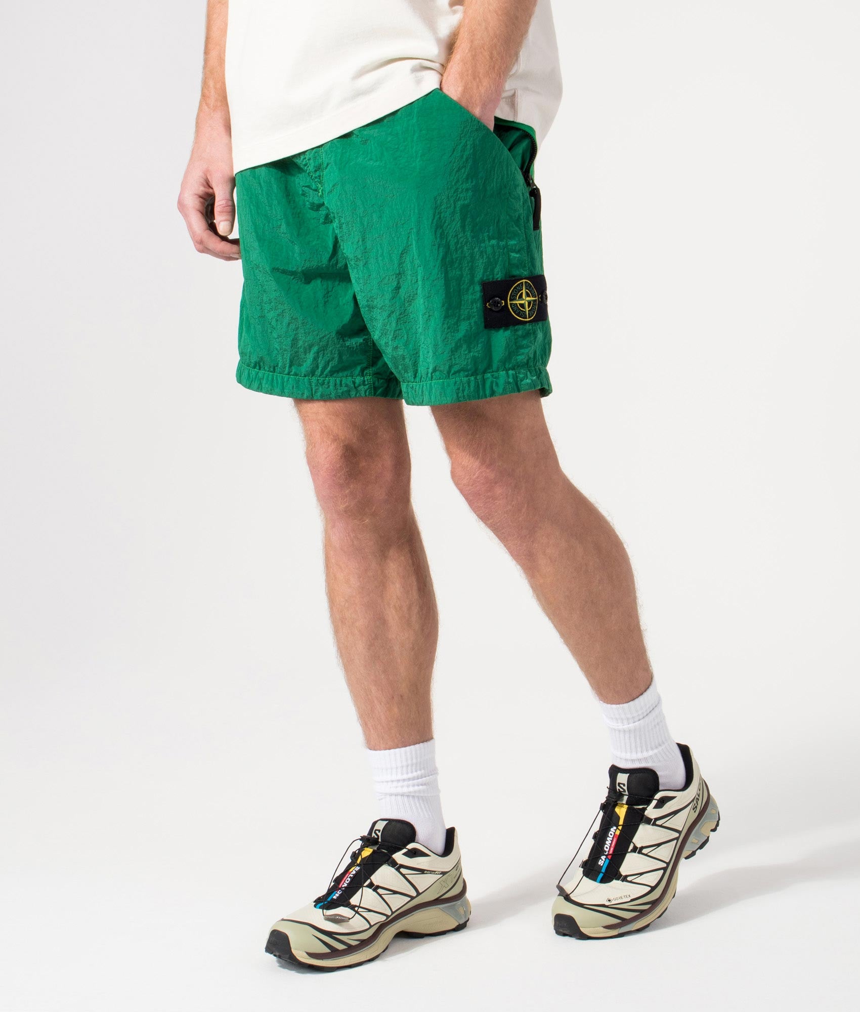 Regular Fit Compass Swim Shorts in Malachite by Stone Island. Shot by EQVVS. Front Shot.