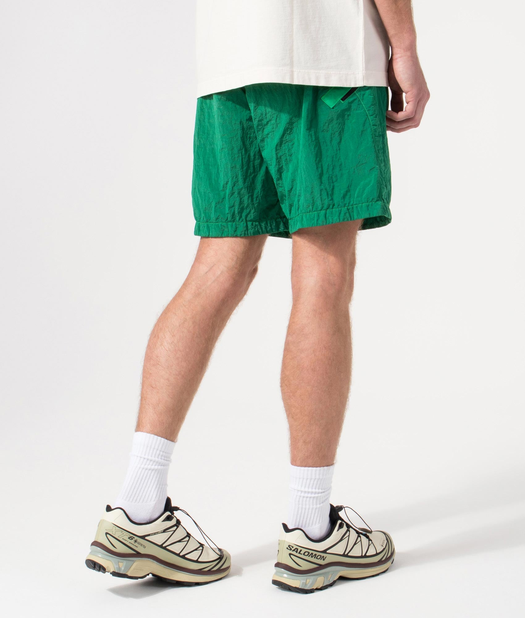 Regular Fit Compass Swim Shorts in Malachite by Stone Island. Shot by EQVVS. Back Shot.