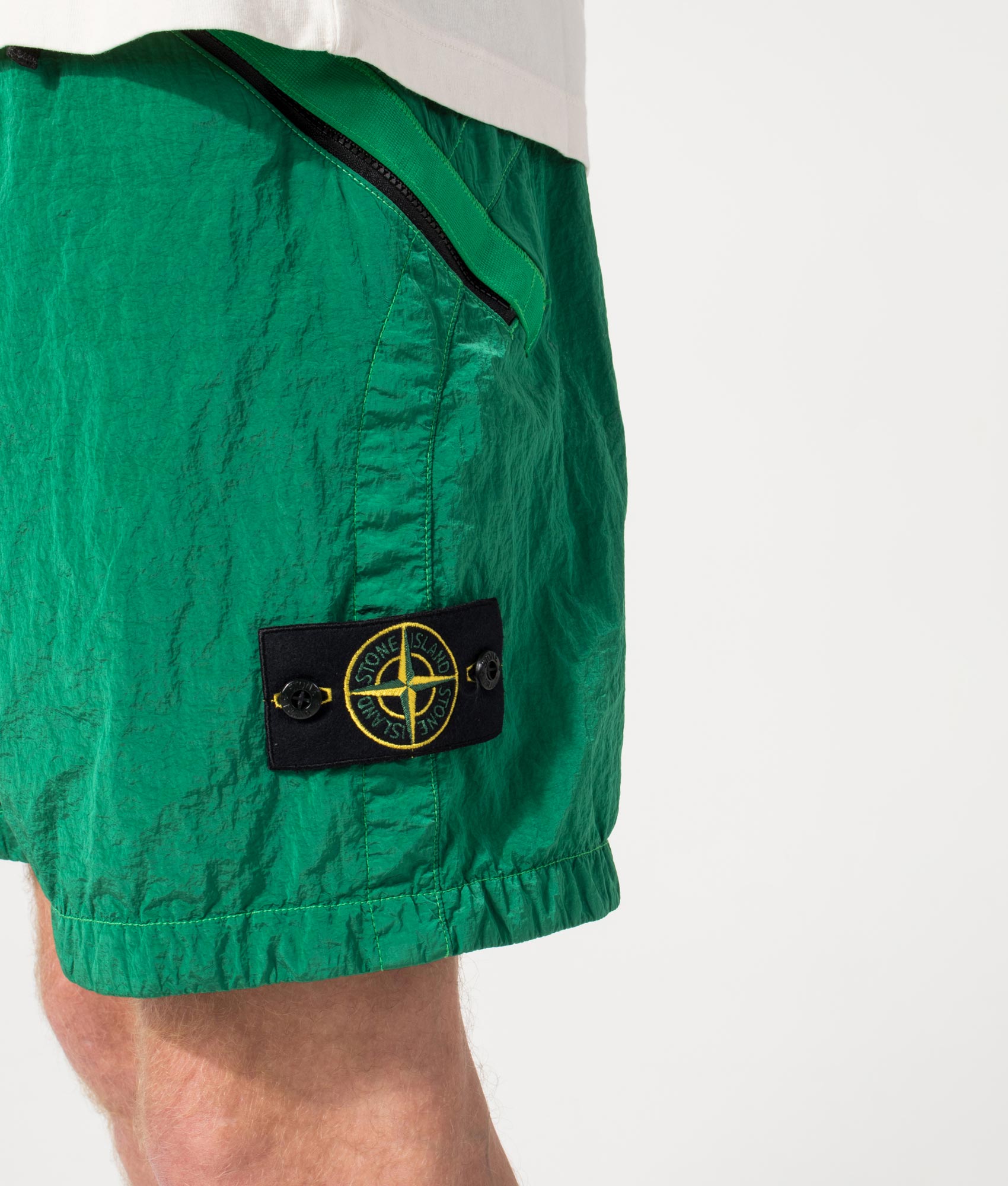 Regular Fit Compass Swim Shorts in Malachite by Stone Island. Shot by EQVVS. Front detail Shot.