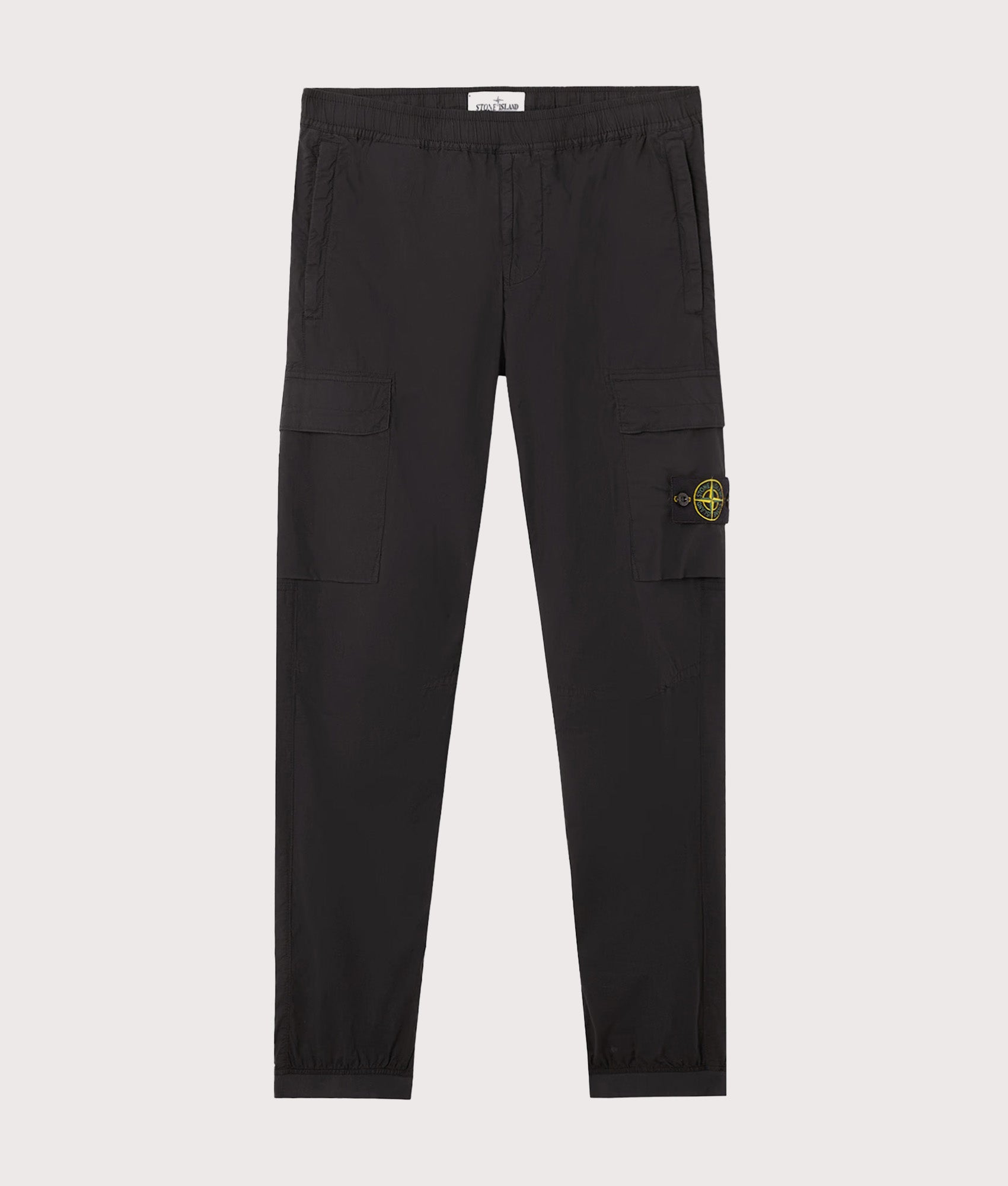 Stone Island Tapered Cargo Pants in Black at EQVVS Menswear. Front shot.