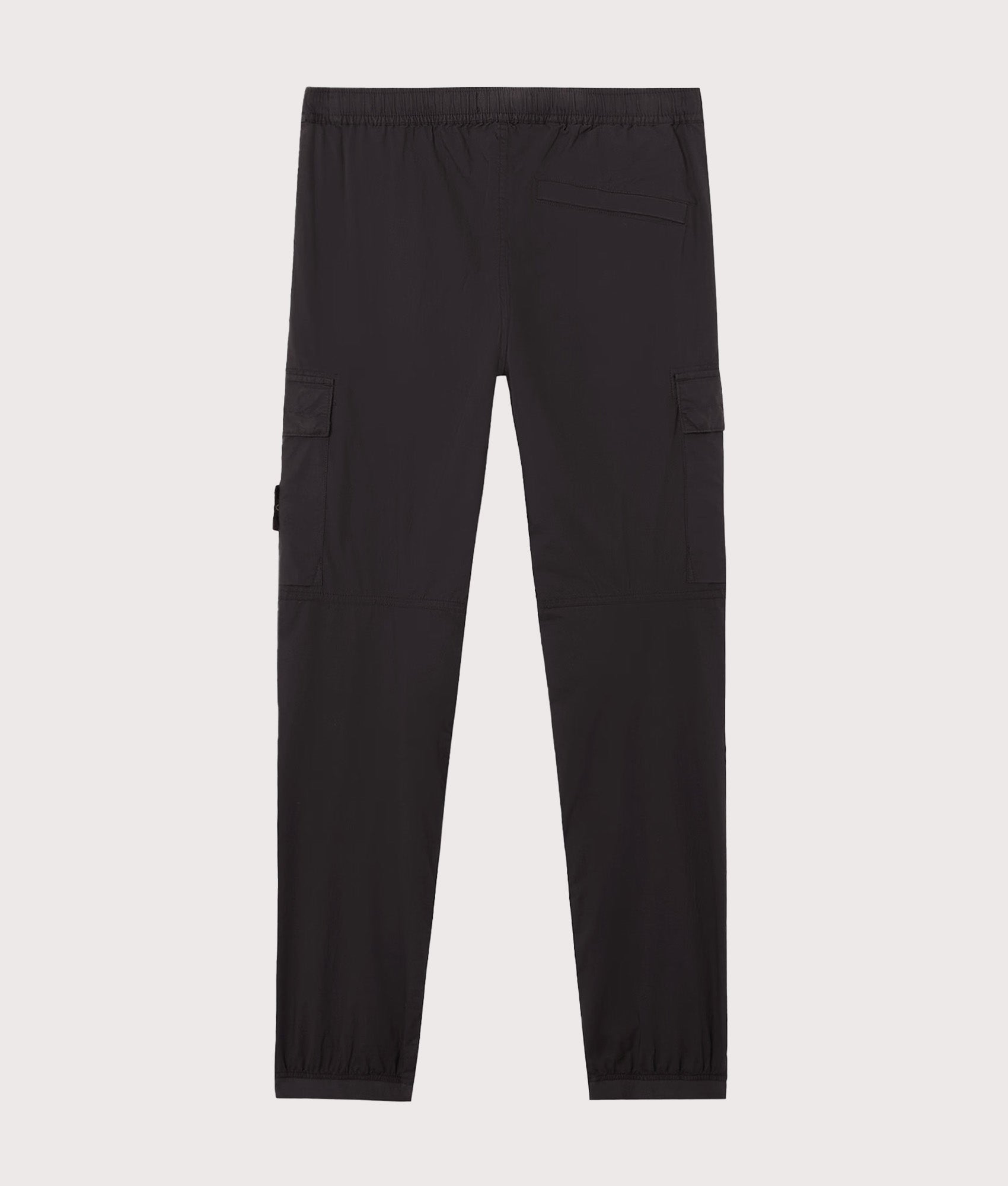 Stone Island Tapered Cargo Pants in Black at EQVVS Menswear. Back shot.