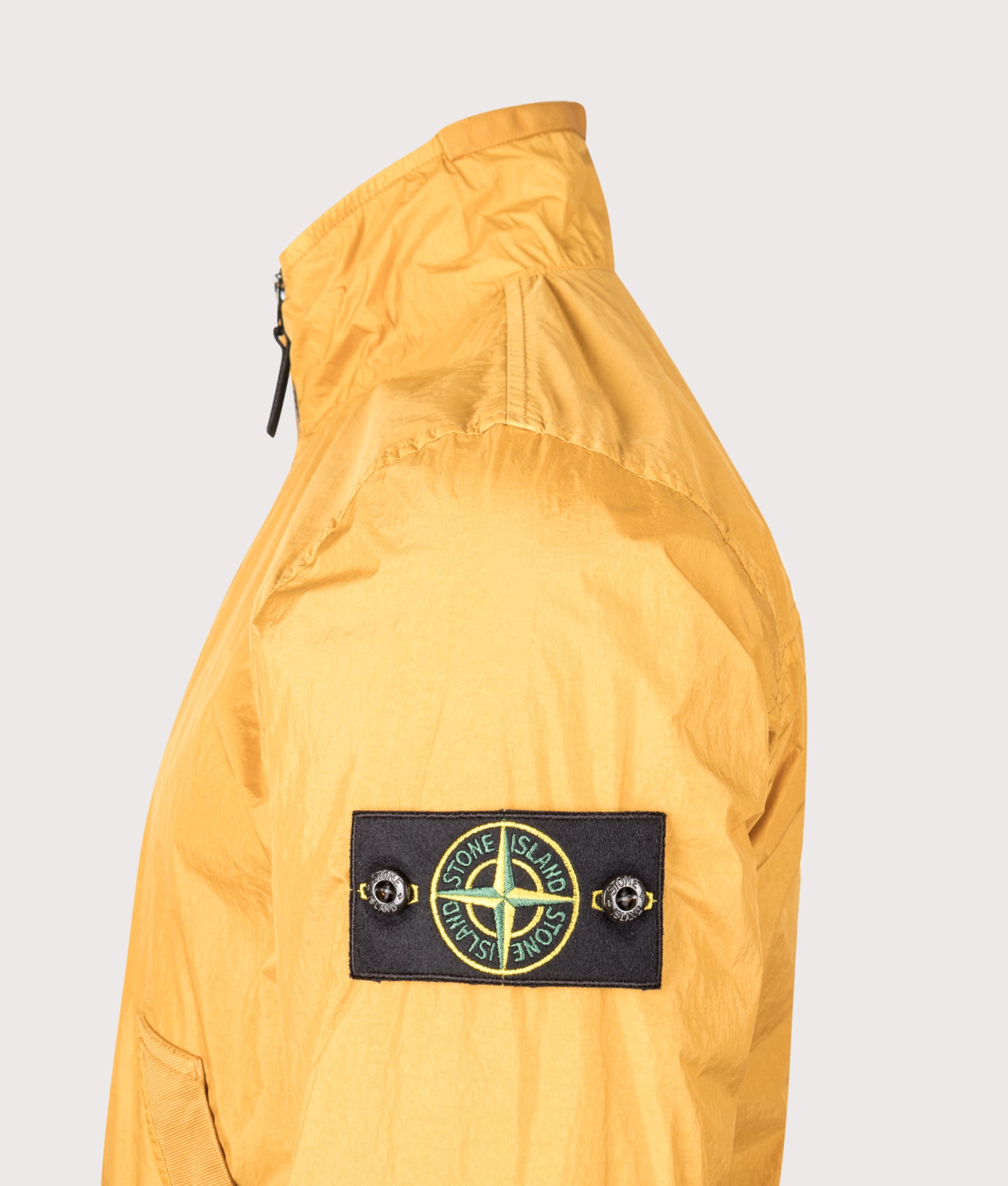 Crinkle Reps NY Stand Collar Bomber Jacket in Mustard | Stone Island | EQVVS | Side detail shot 