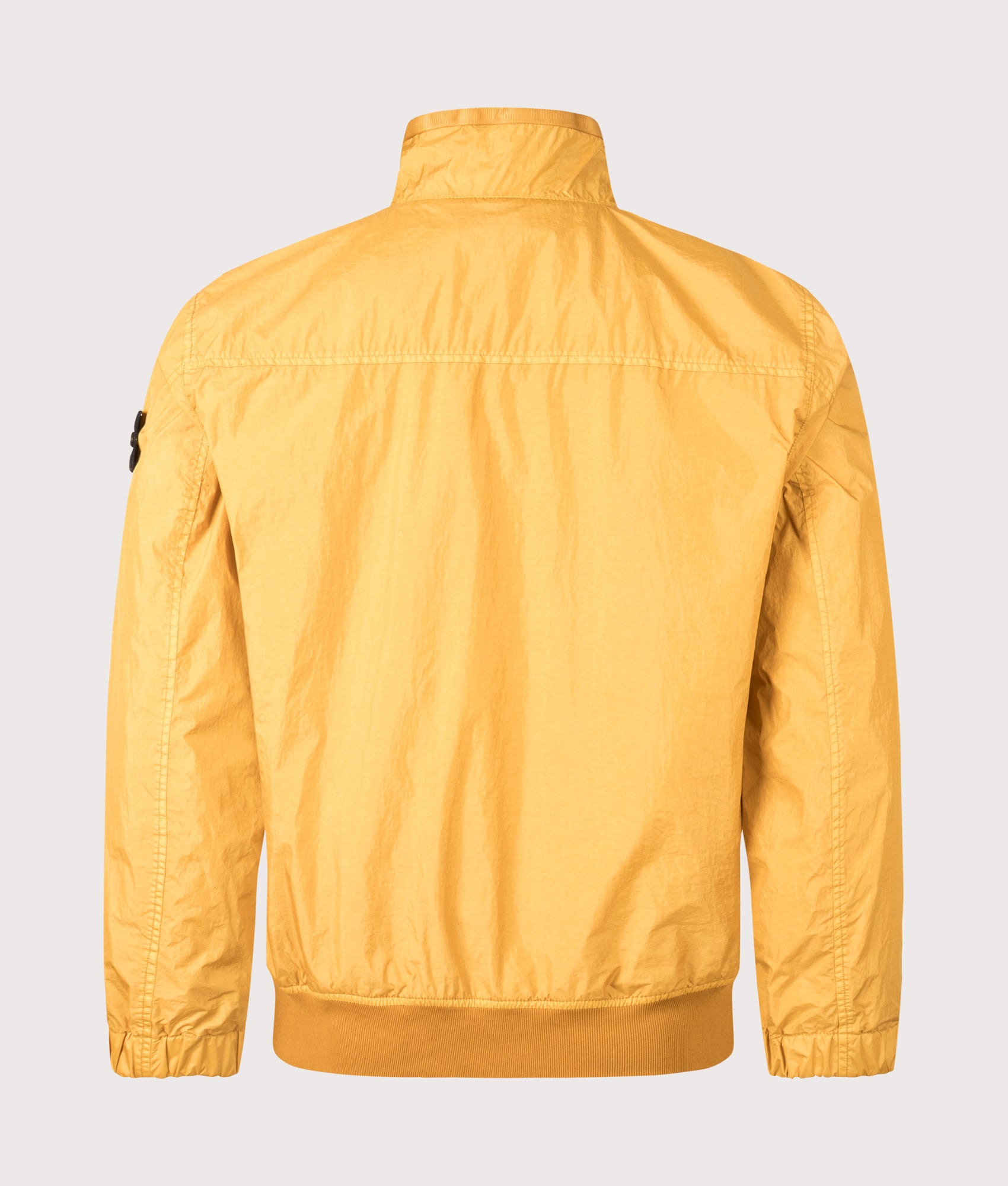 Crinkle Reps NY Stand Collar Bomber Jacket in Mustard | Stone Island | EQVVS | Back shot