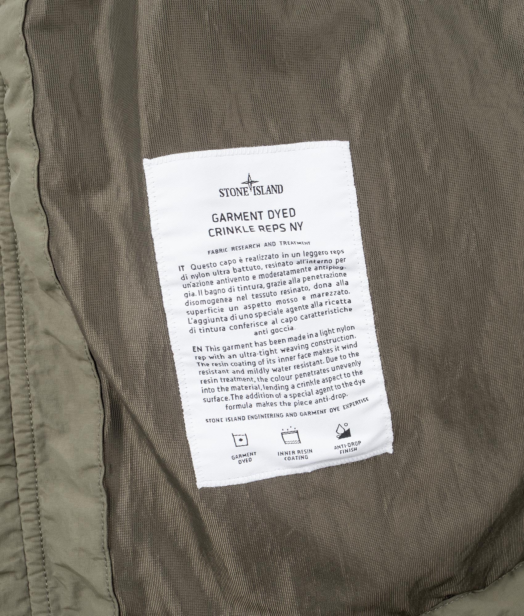 Hooded Full Zip Jacket in Military Green | Stone Island | EQVVS | Label shot 