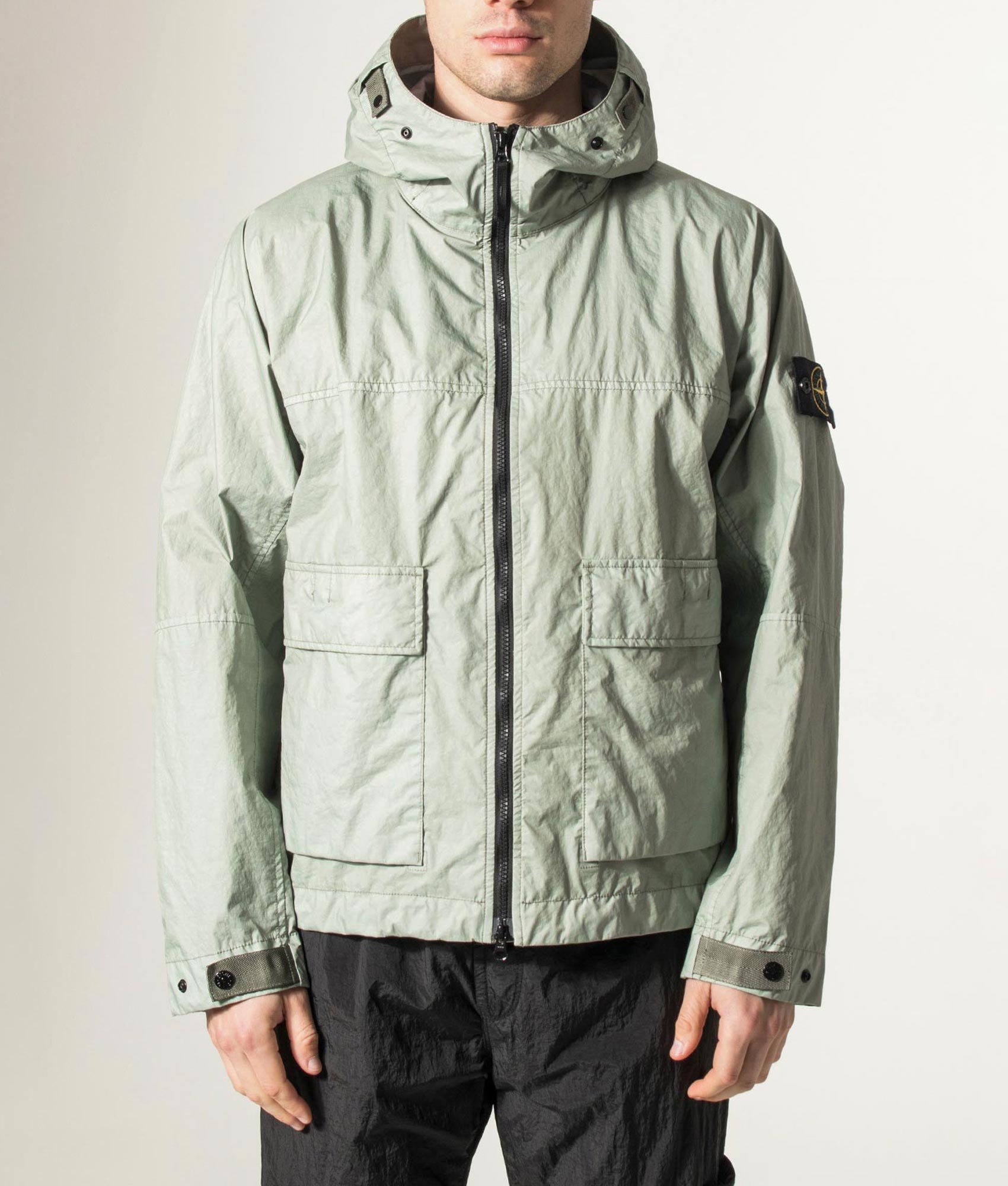 Stone Island Membrana 3L TC Jacket in Sage at EQVVS Menswear. Model front shot.