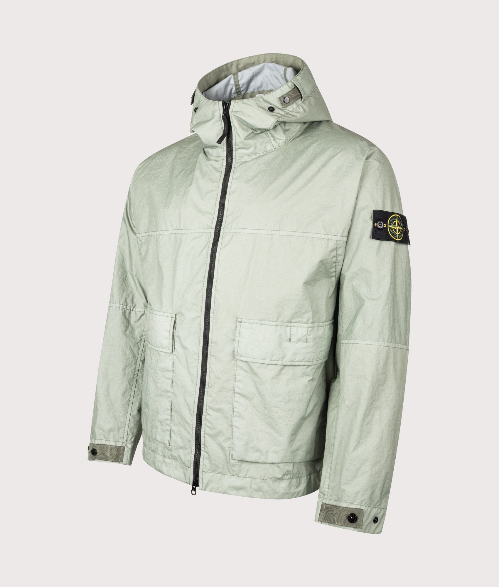 Stone Island Membrana 3L TC Jacket in Sage at EQVVS Menswear. Angled front shot.