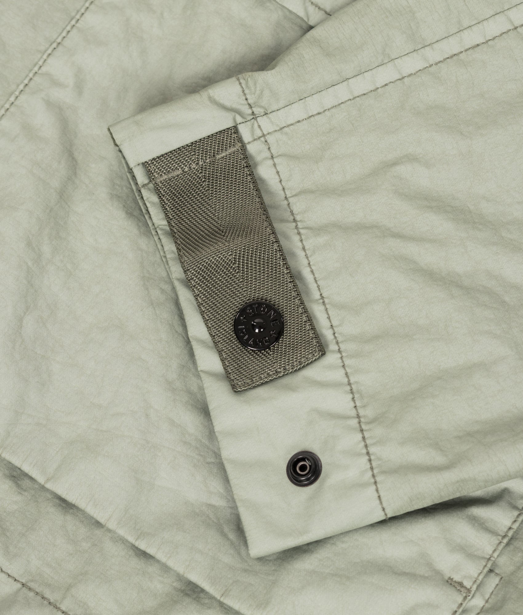 Stone Island Membrana 3L TC Jacket in Sage at EQVVS Menswear. Third detail shot.