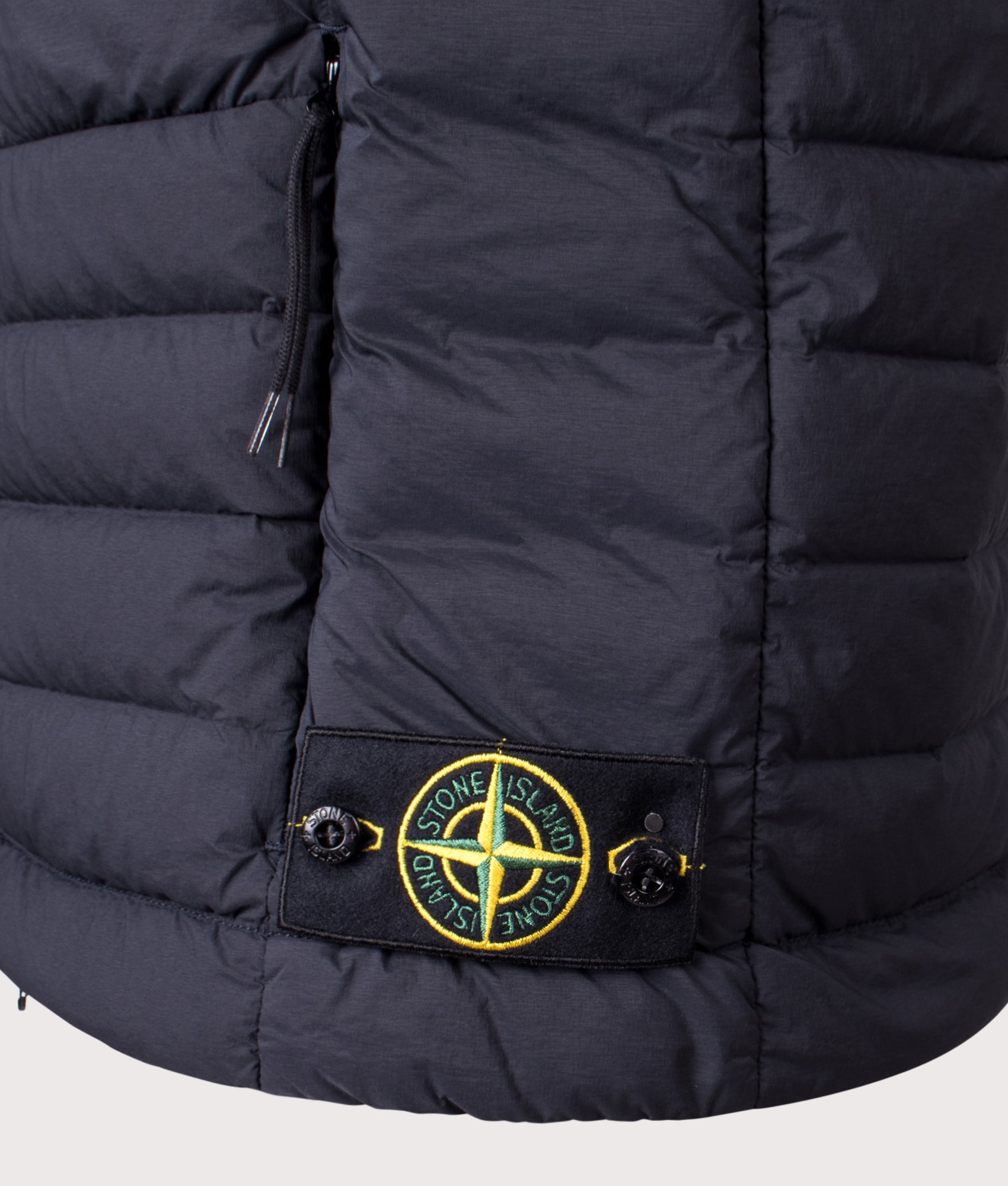 Stone Island Seamless Tunnel Nylon Down-TC Vest in Navy Blue at EQVVS Menswear. Detail shot.