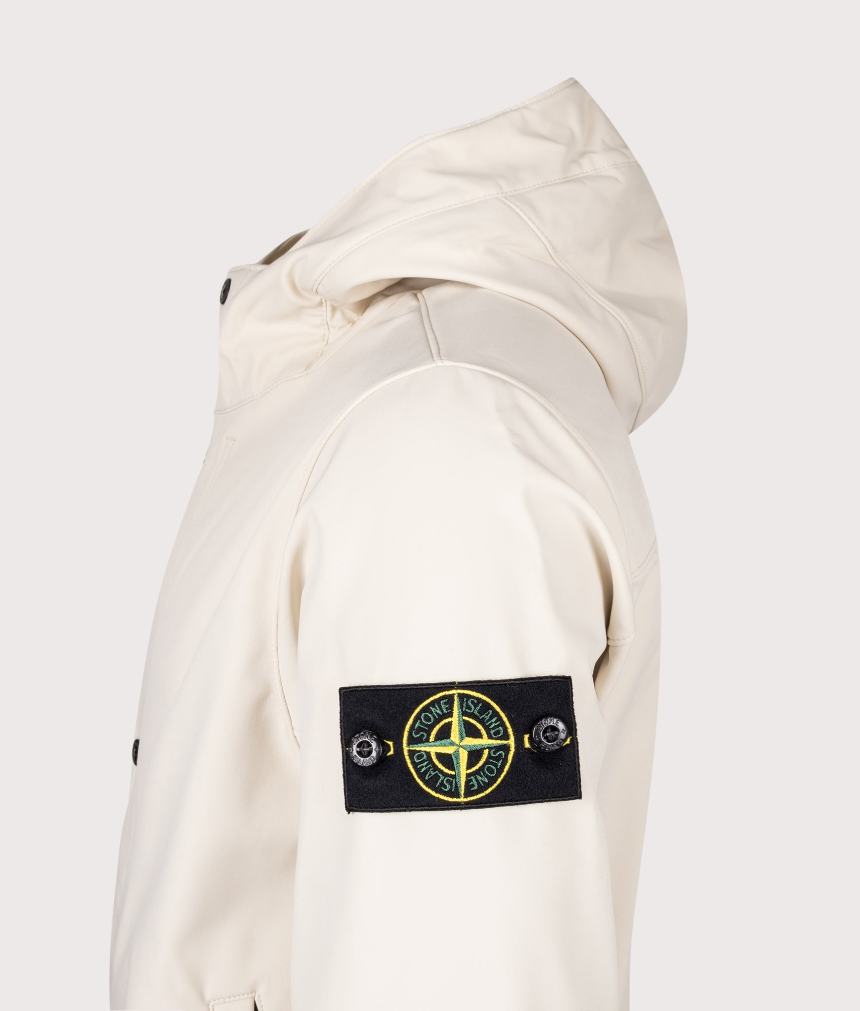 Stone Island Light Soft Shell-R E.DYE® Technology Hooded Jacket in Ivory at EQVVS Menswear. Detail shot.