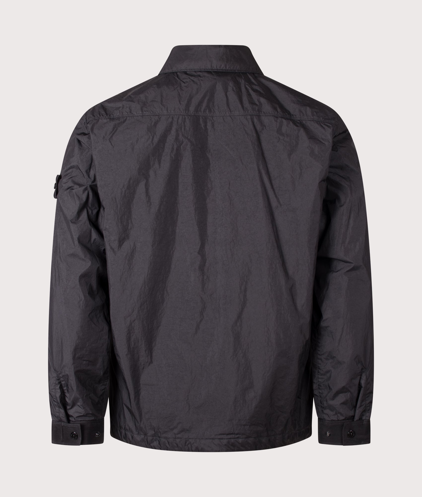 Stone Island Crinkle Reps NY Jacket in Black at EQVVS Menswear. Back shot.