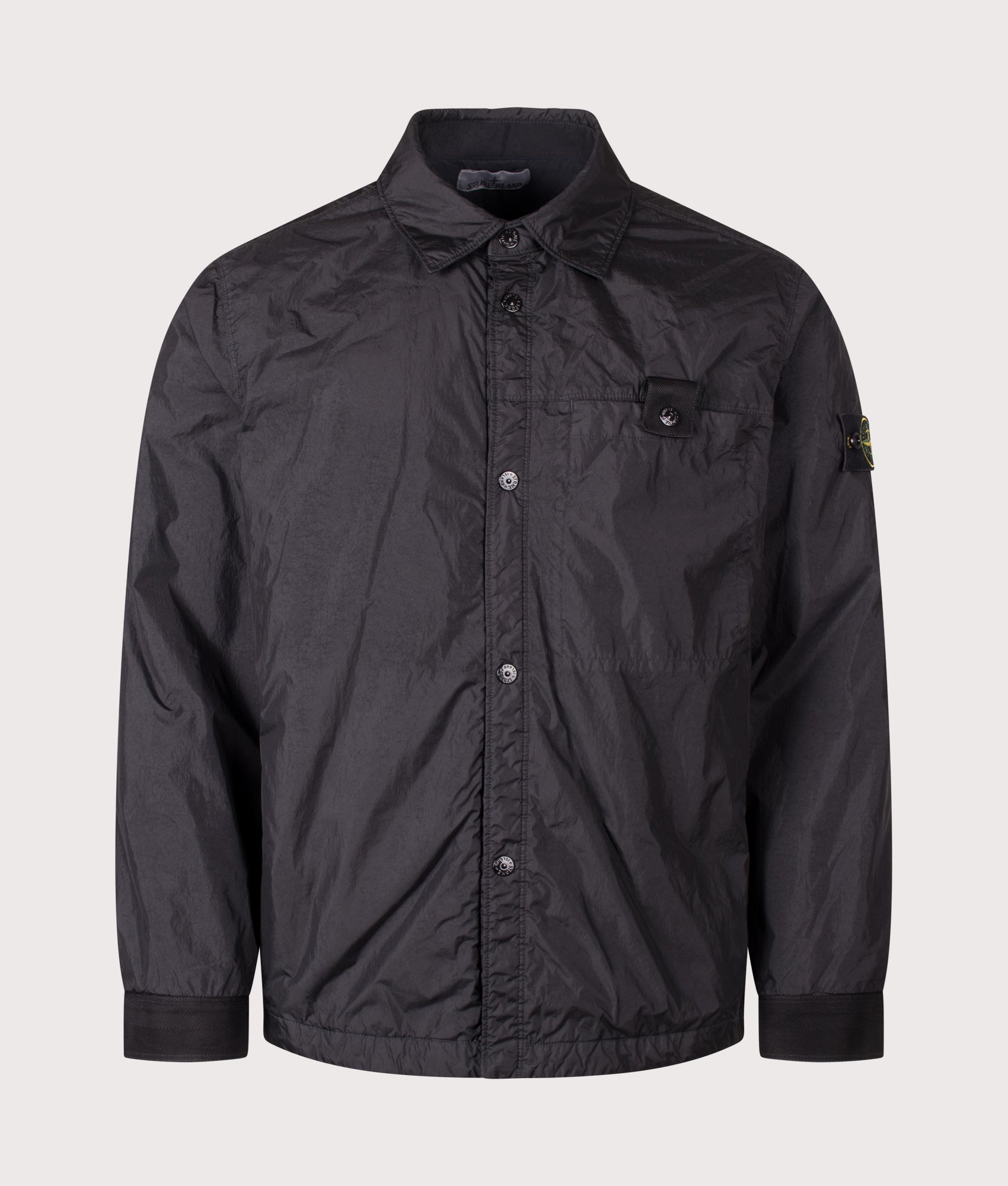 Stone Island Crinkle Reps NY Jacket in Black at EQVVS Menswear. Front shot.
