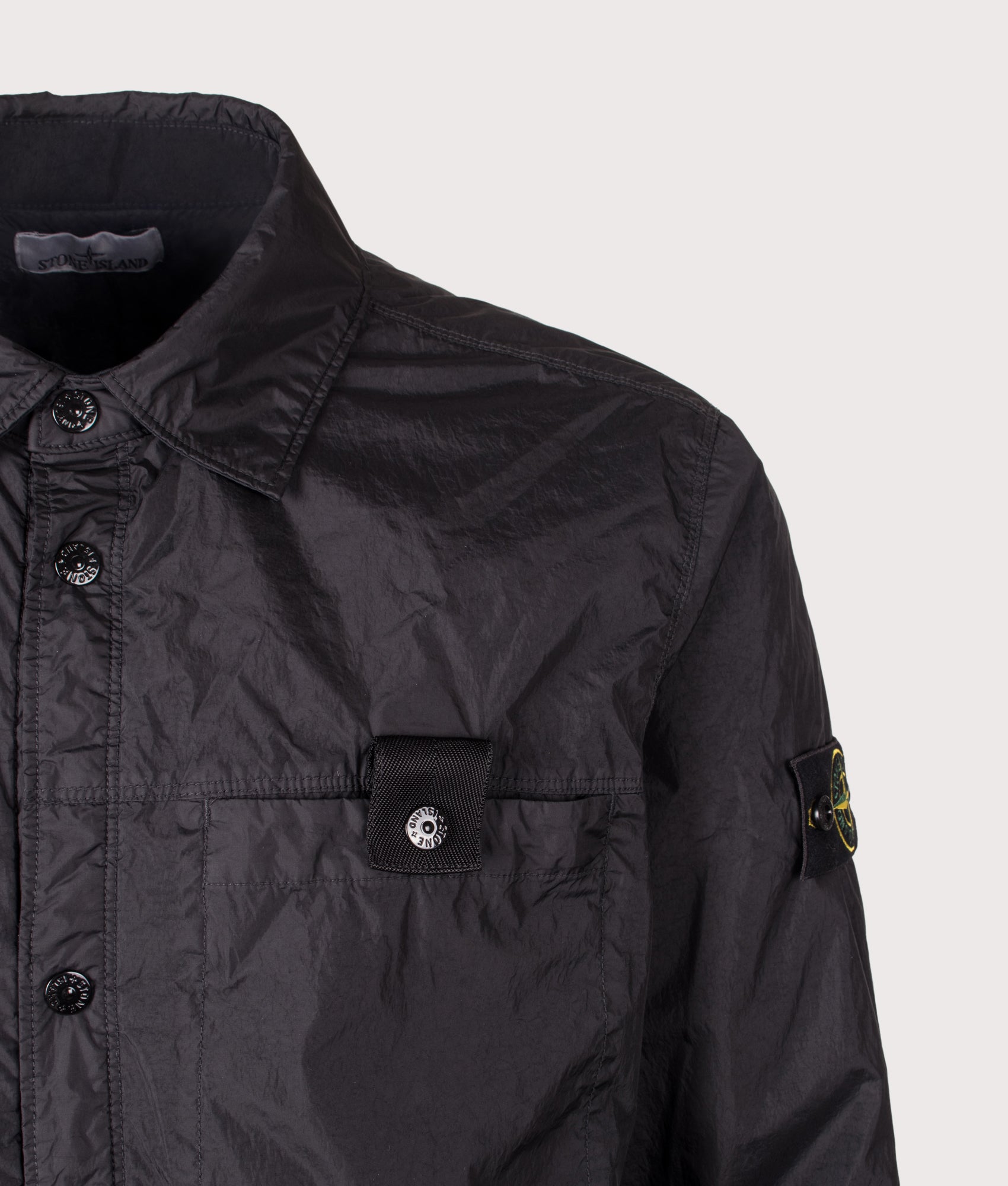 Stone Island Crinkle Reps NY Jacket in Black at EQVVS Menswear. Second detail shot.