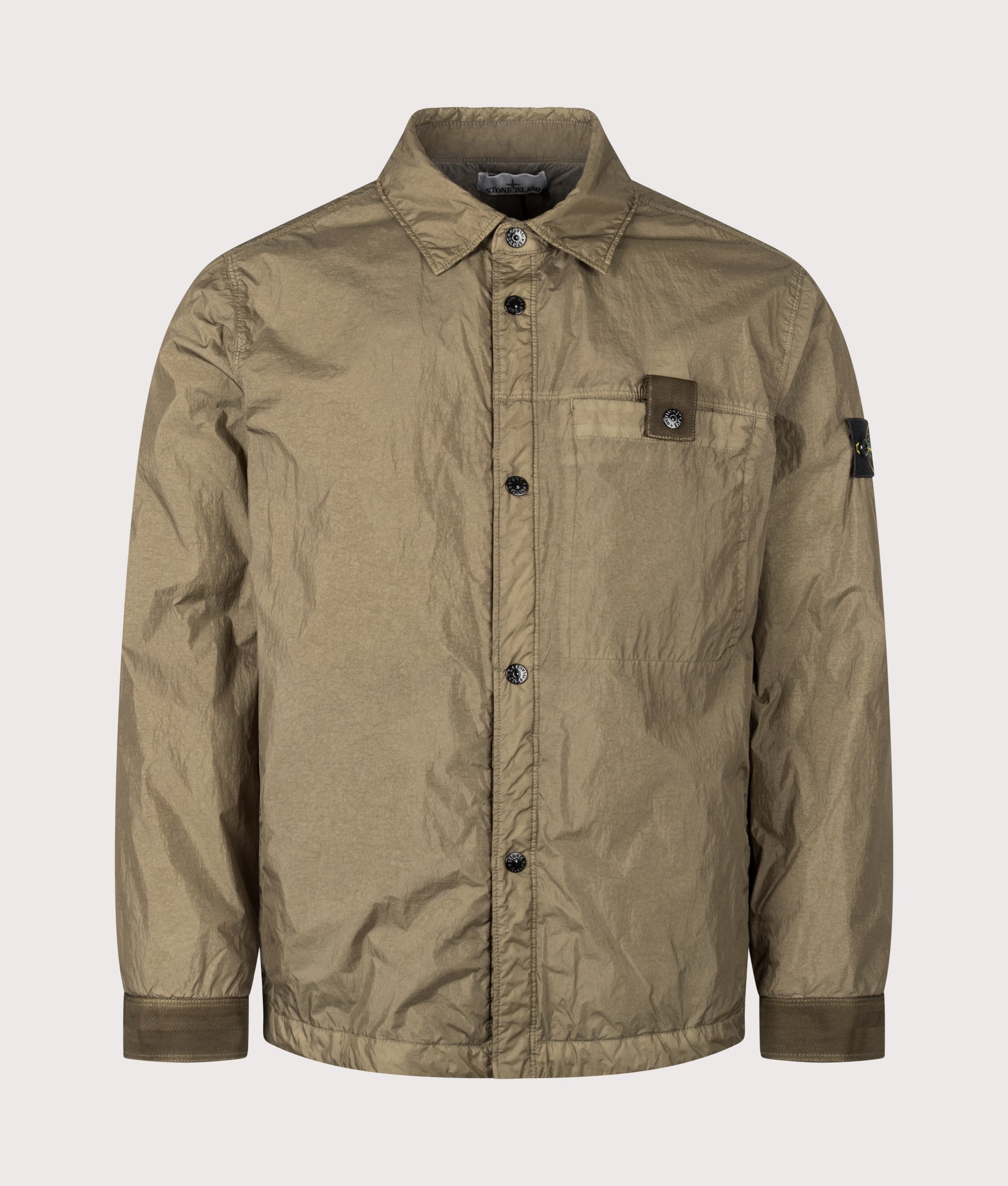 Stone Island Crinkle Reps NY Jacket in Military Green at EQVVS Menswear. Front shot.