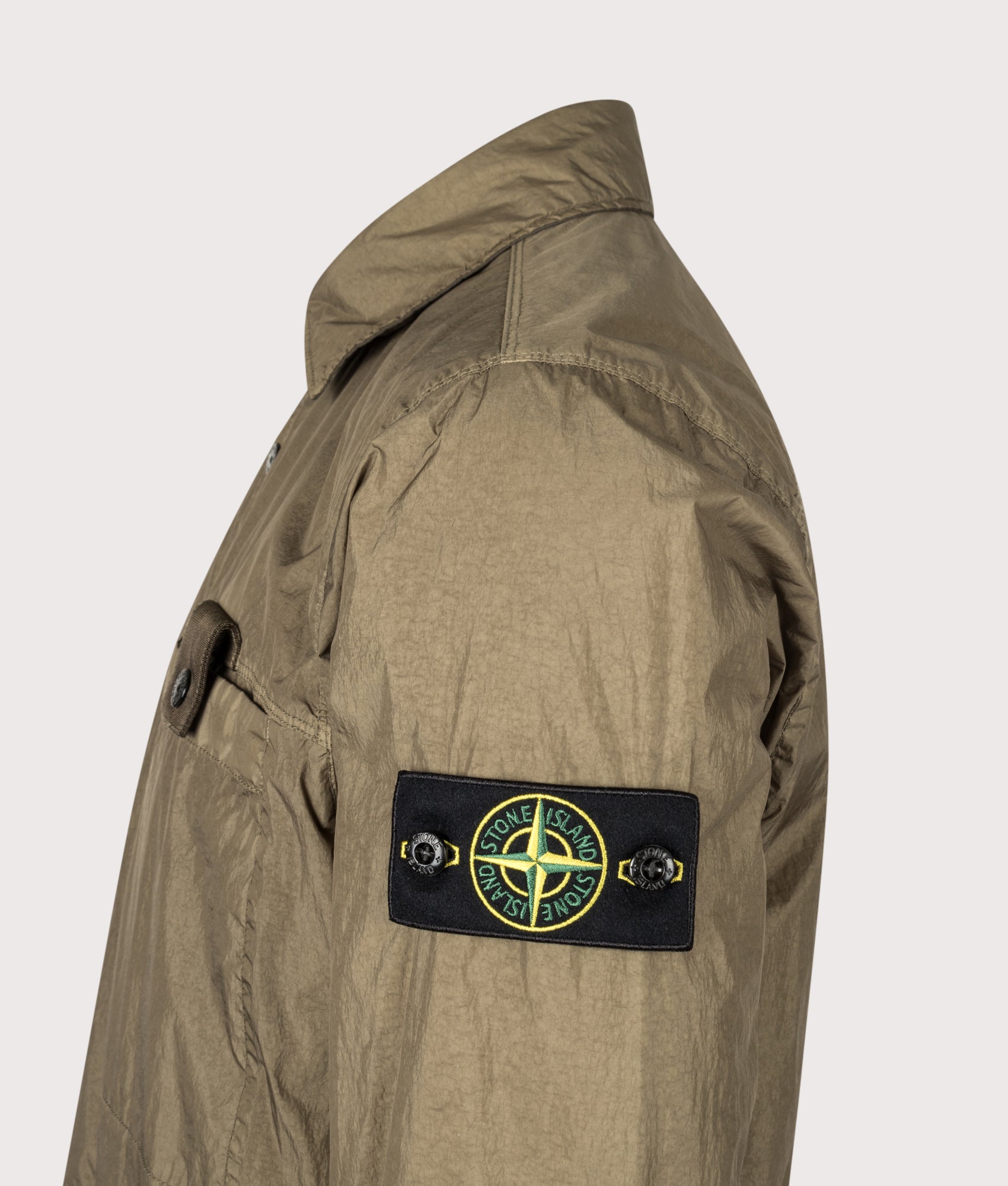 Stone Island Crinkle Reps NY Jacket in Military Green at EQVVS Menswear. Detail shot.