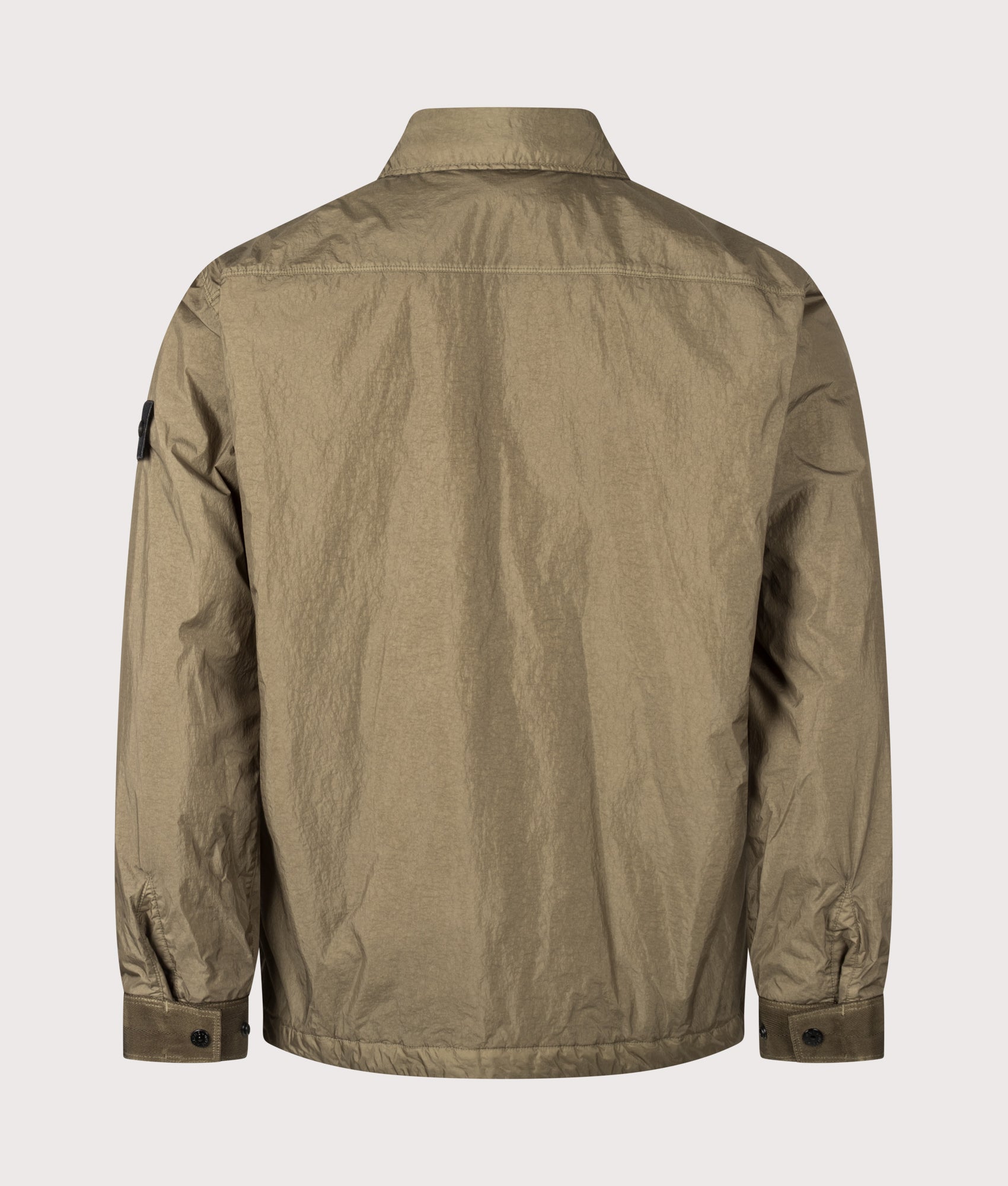 Stone Island Crinkle Reps NY Jacket in Military Green at EQVVS Menswear. Back shot.