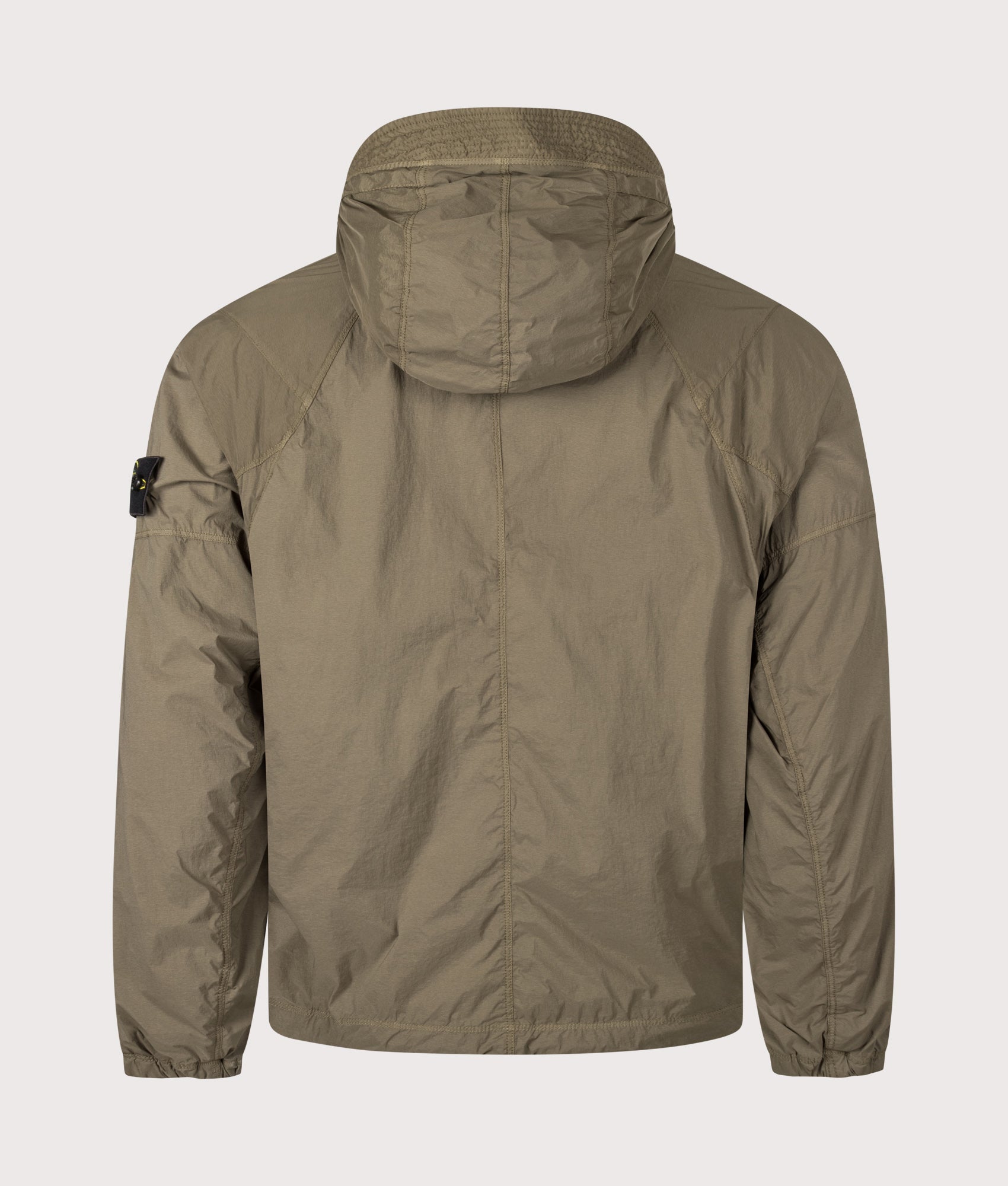 Stone Island Ultralight Nylon Stretch-TC Jacket in Military Green at EQVVS Menswear. Back shot.