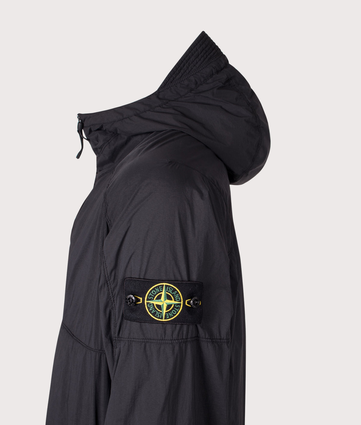 Stone Island Ultralight Nylon Stretch-TC Jacket in Black at EQVVS Menswear. Detail shot.