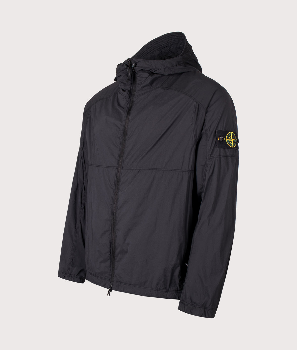 Stone Island Ultralight Nylon Stretch-TC Jacket in Black at EQVVS Menswear. Angled front shot.