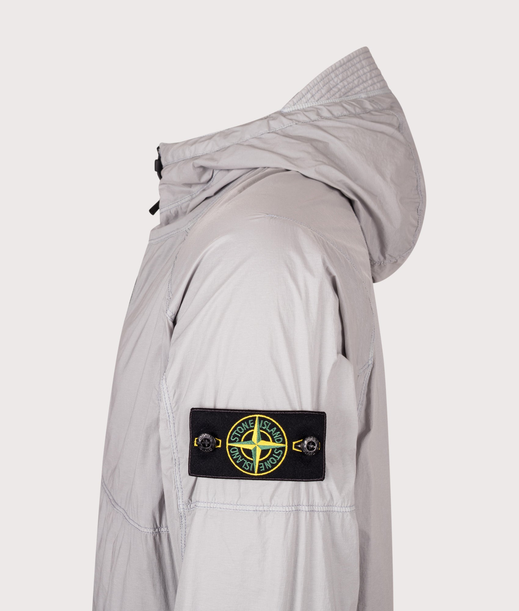 Stone Island Ultralight Nylon Stretch-TC Jacket in Ash Grey at EQVVS Menswear. Detail Shot.