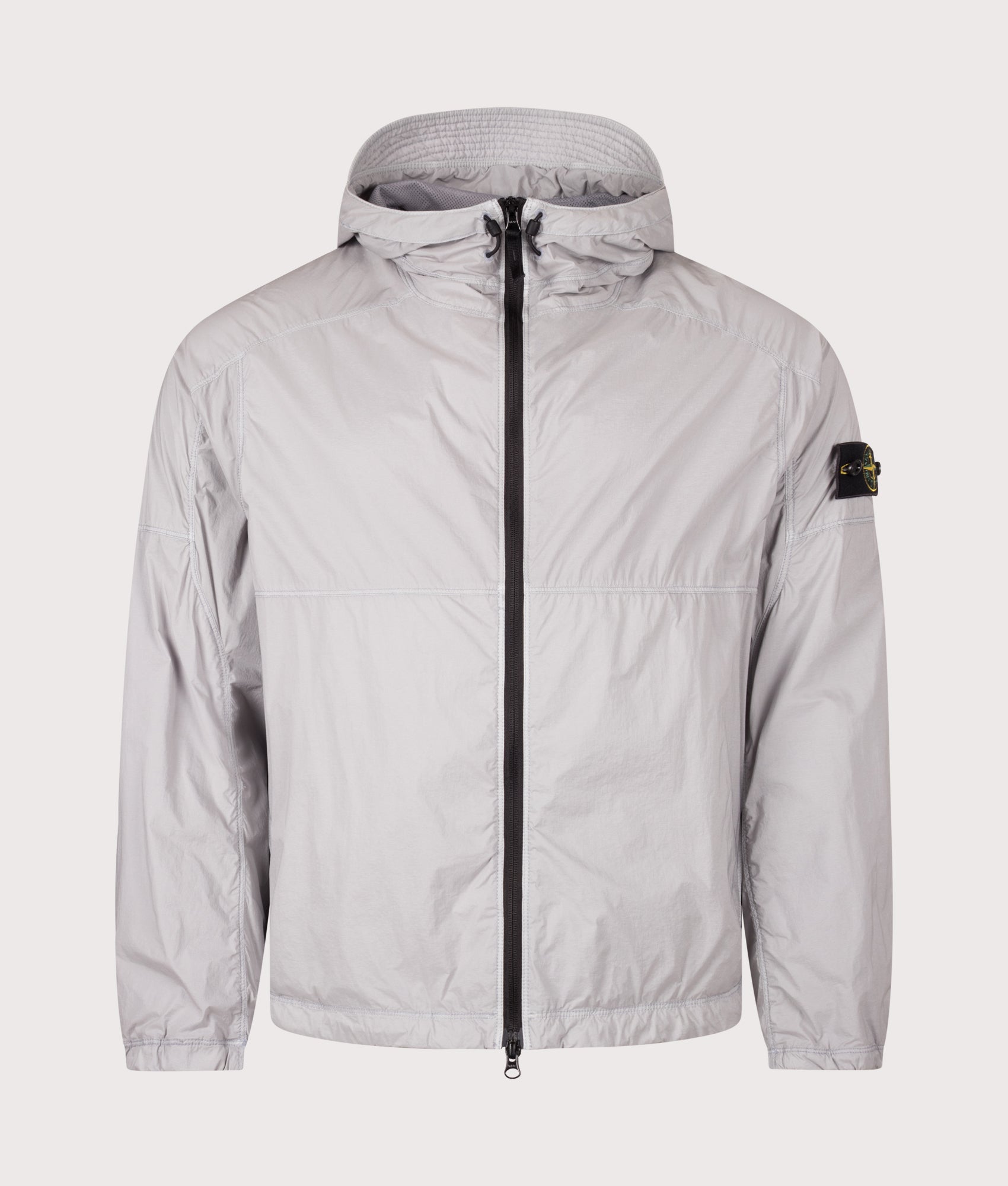 Stone Island Ultralight Nylon Stretch-TC Jacket in Ash Grey at EQVVS Menswear. Front shot.