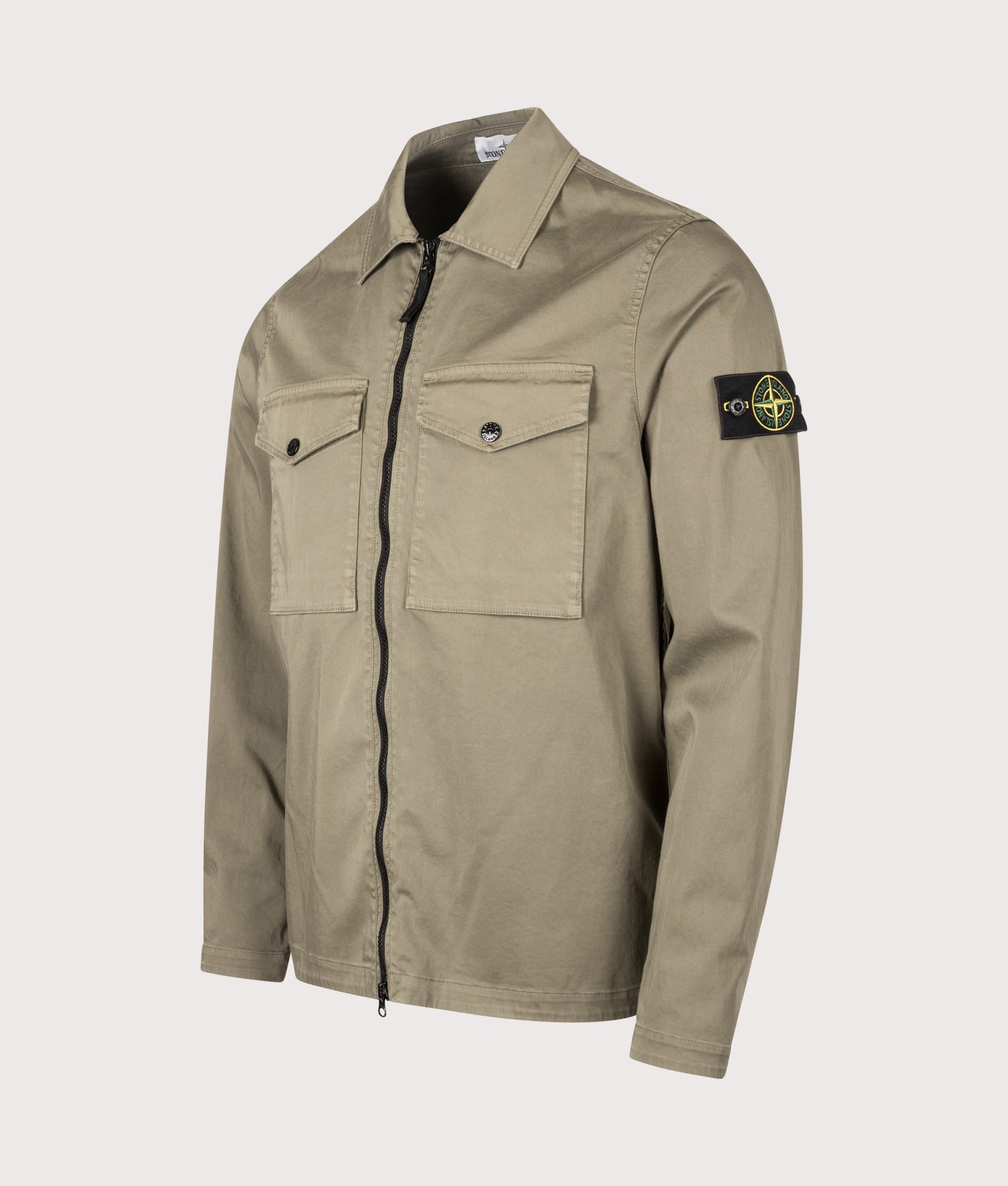 Stone Island Stretch Organic Cotton Satin Overshirt in Military Green at EQVVS Menswear. Angled front shot.