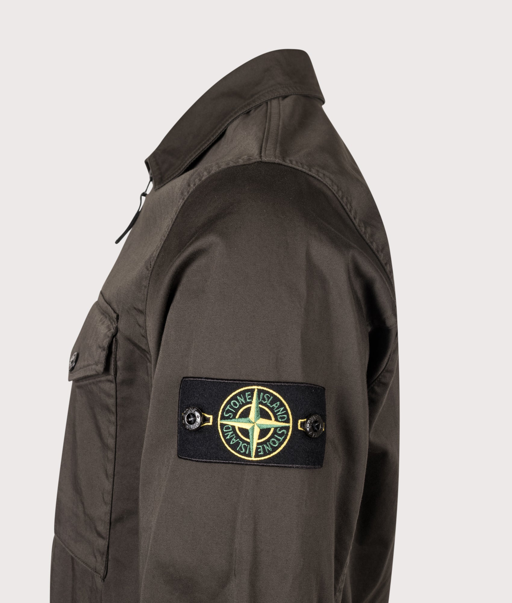 Stone Island Stretch Organic Cotton Satin Overshirt in Coal Grey at EQVVS Menswear. Detail shot.