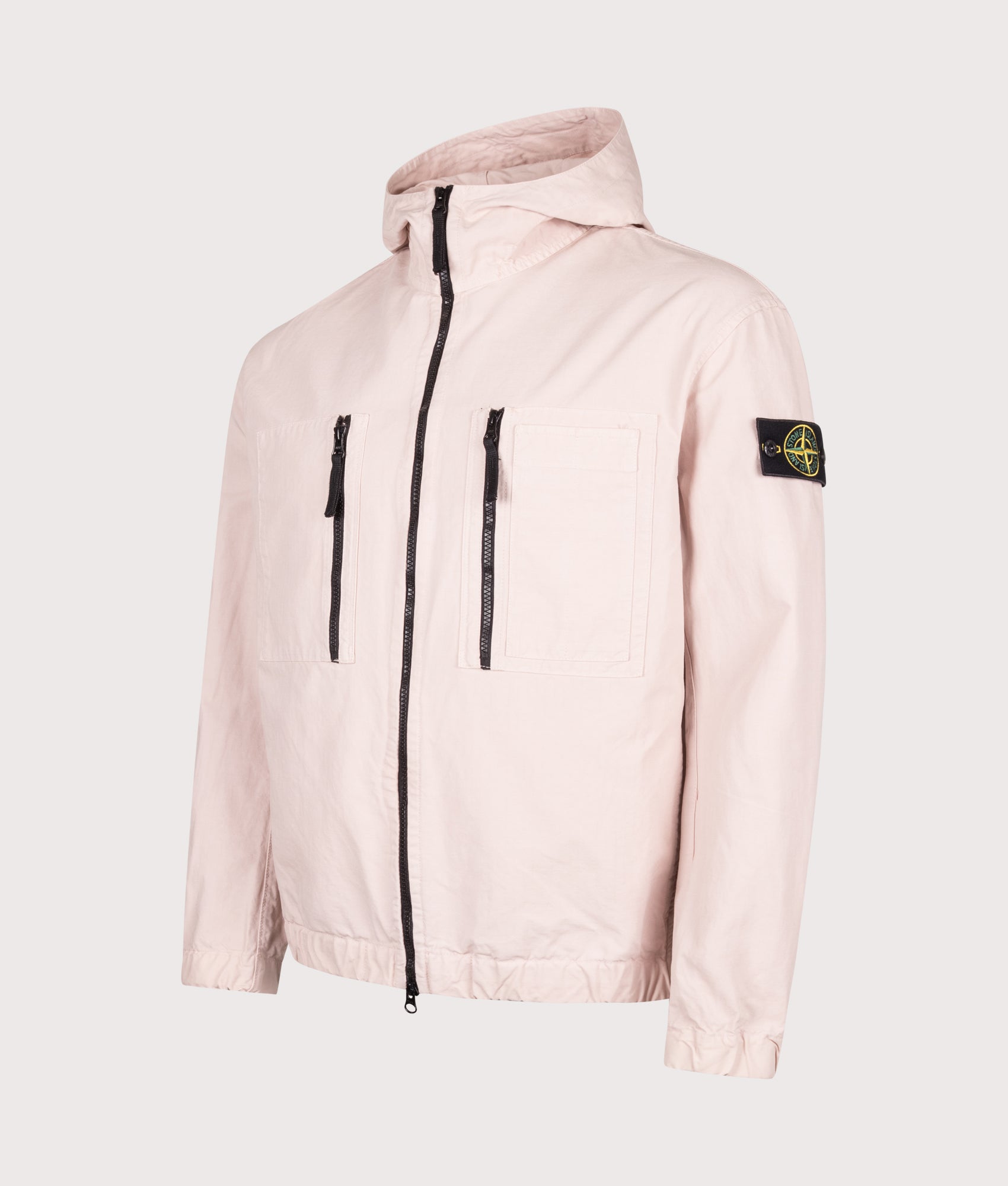 Stone Island Comfort Fit Organic Cotton Ripstop Hooded Overshirt in Antique Rose at EQVVS Menswear. Angled front shot.