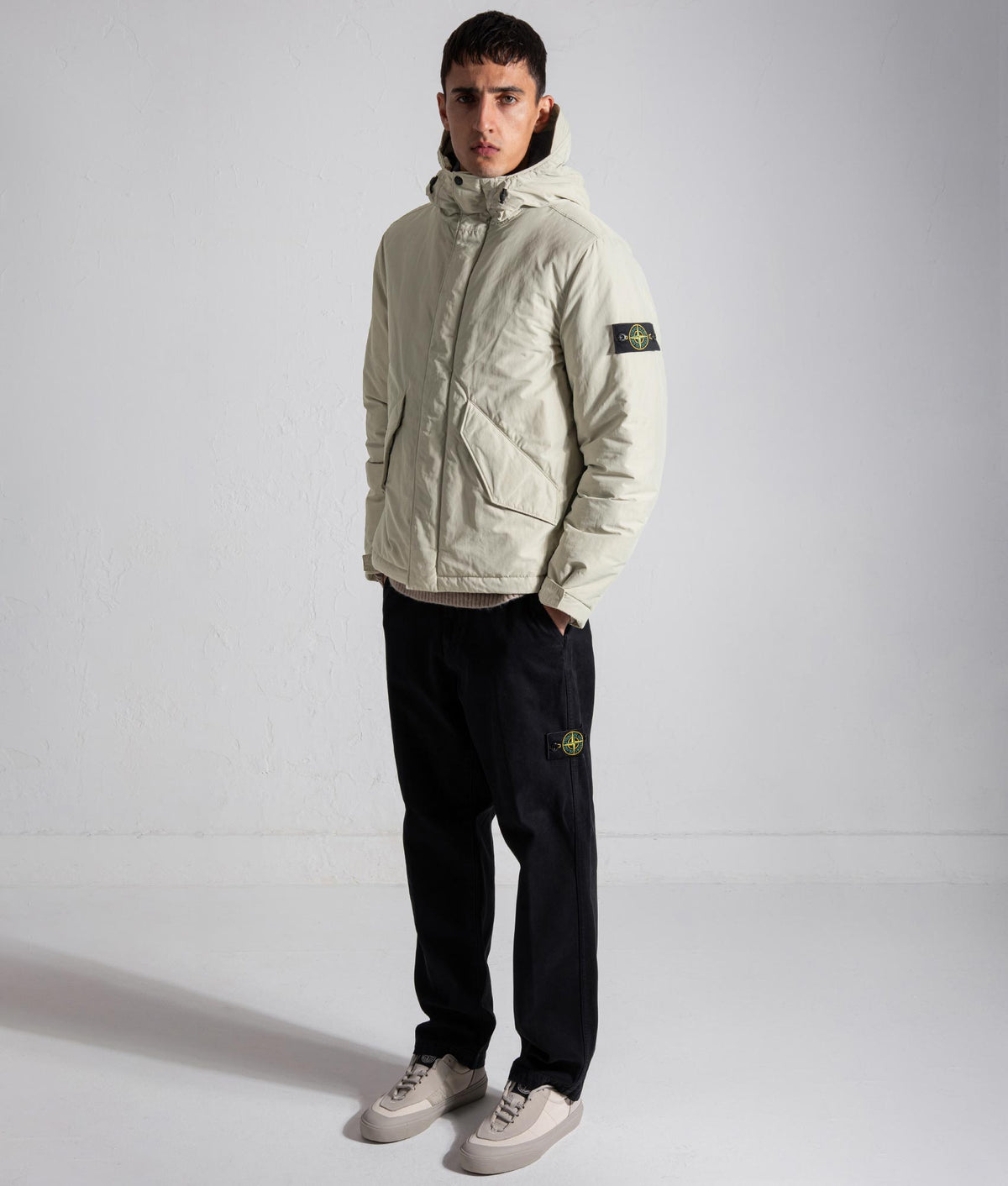 Stone Island Micro Twill Jacket in Sand at EQVVS Menswear. Model front shot.