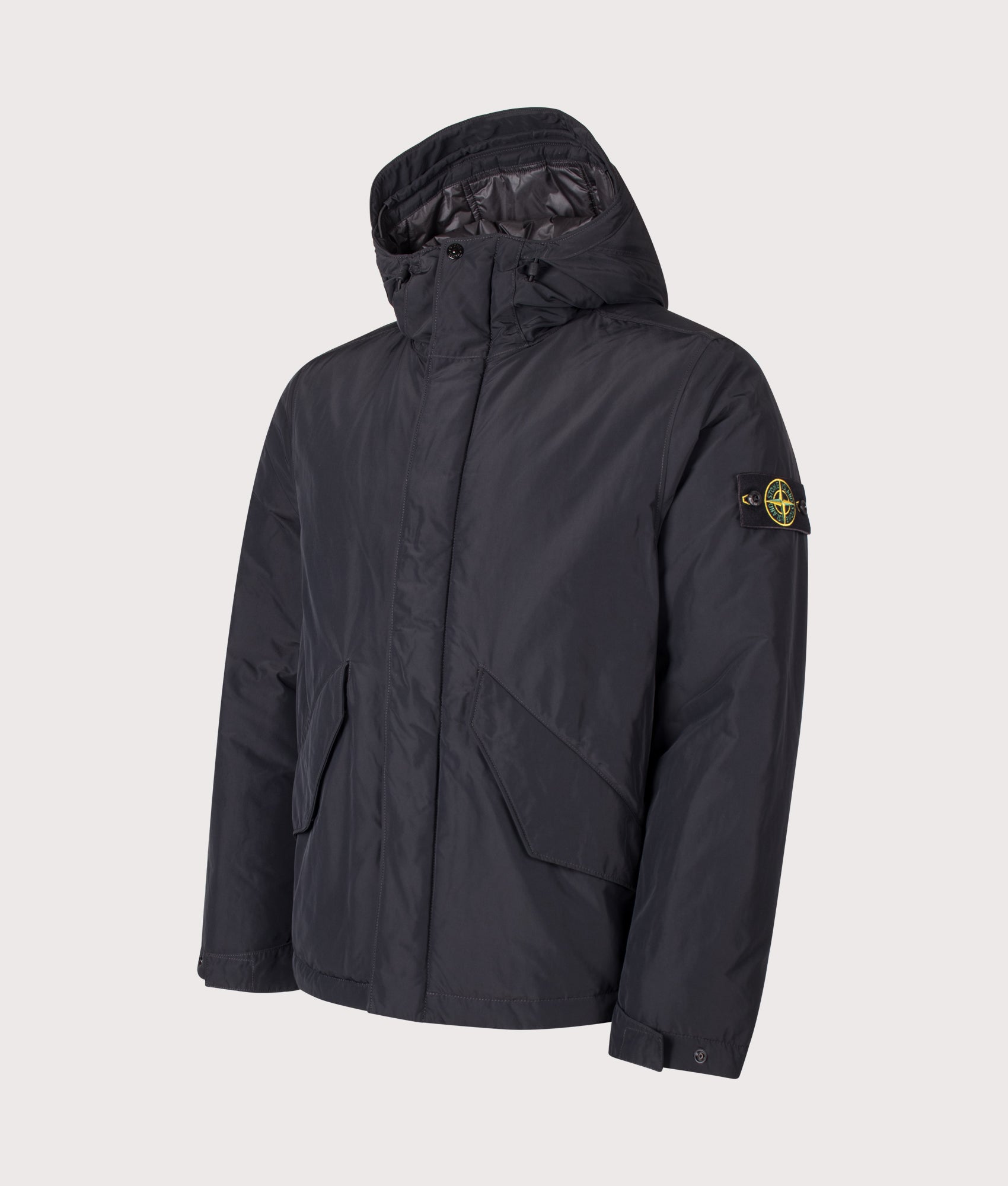 Stone Island Micro Twill Jacket in Black at EQVVS Menswear. Angled front shot.