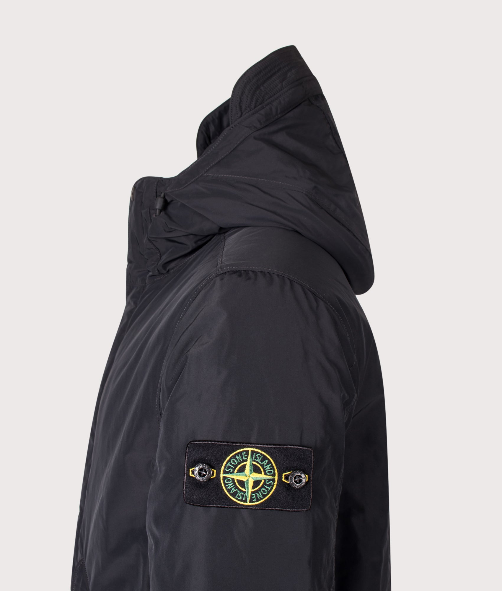 Stone Island Micro Twill Jacket in Black at EQVVS Menswear. Detail shot.