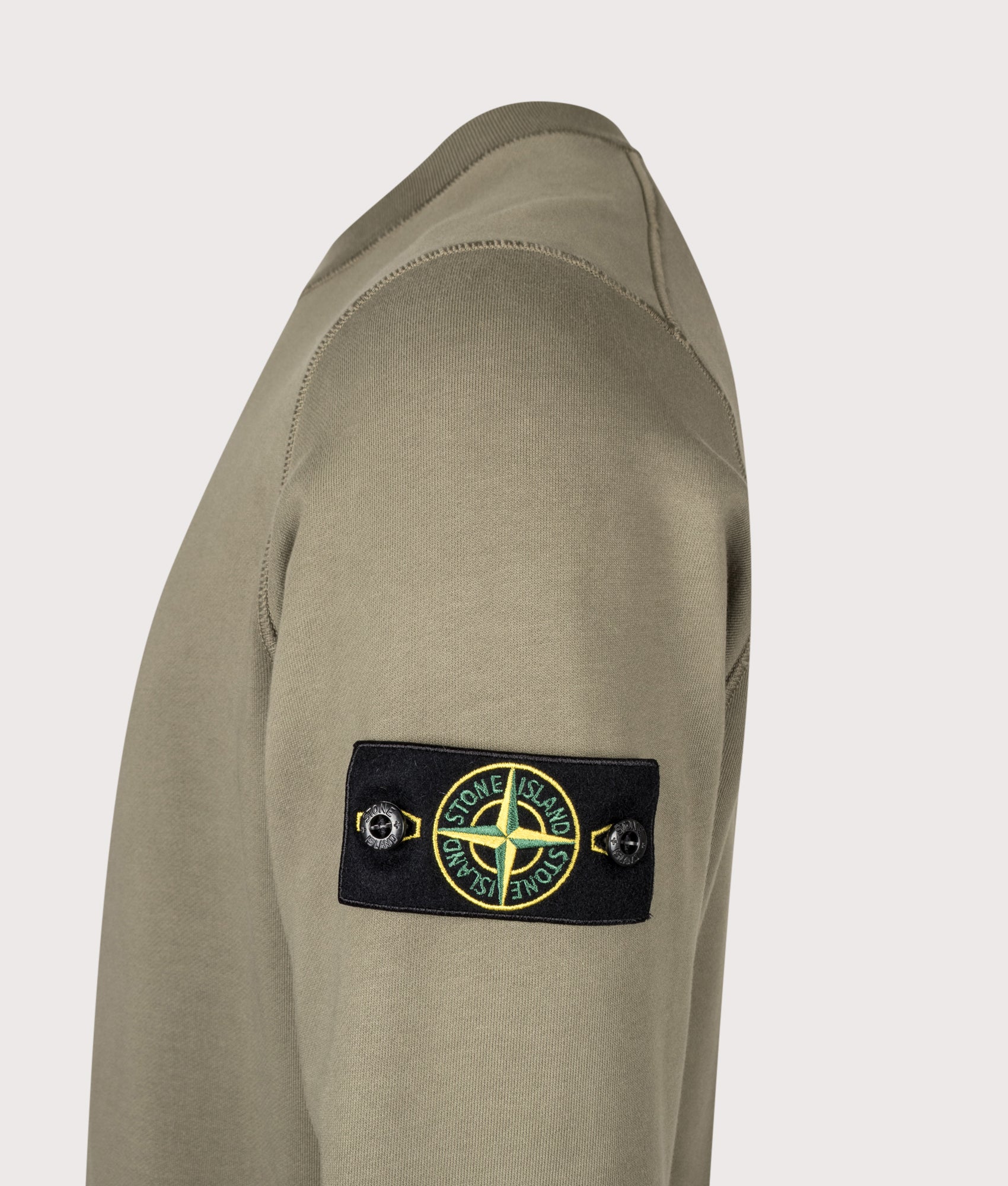 Stone Island Organic Cotton Fleece Sweatshirt in Military Green at EQVVS Menswear. Detail shot.