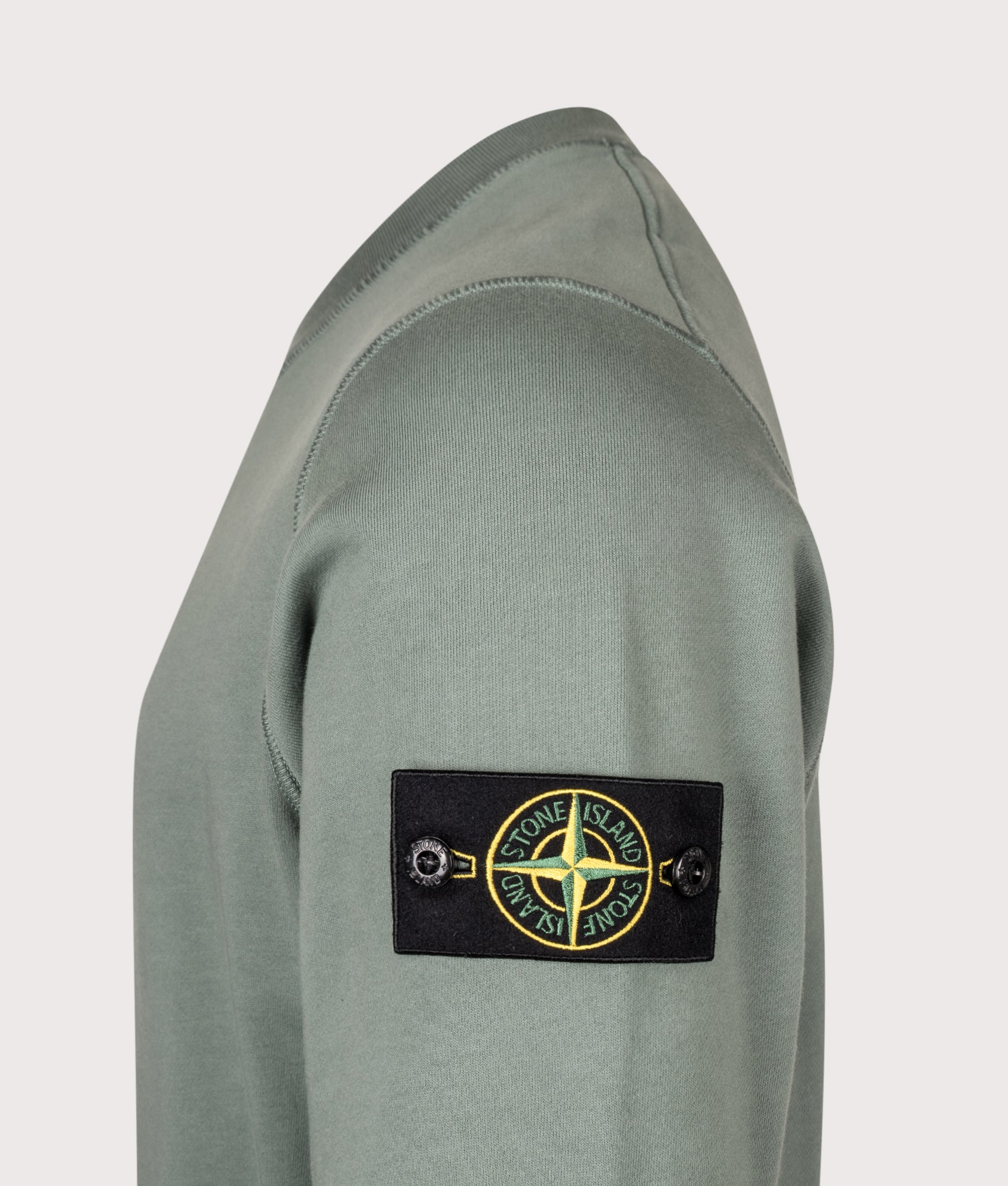Stone Island Organic Cotton Fleece Sweatshirt in Ocean Green at EQVVS Menswear. Detail shot.