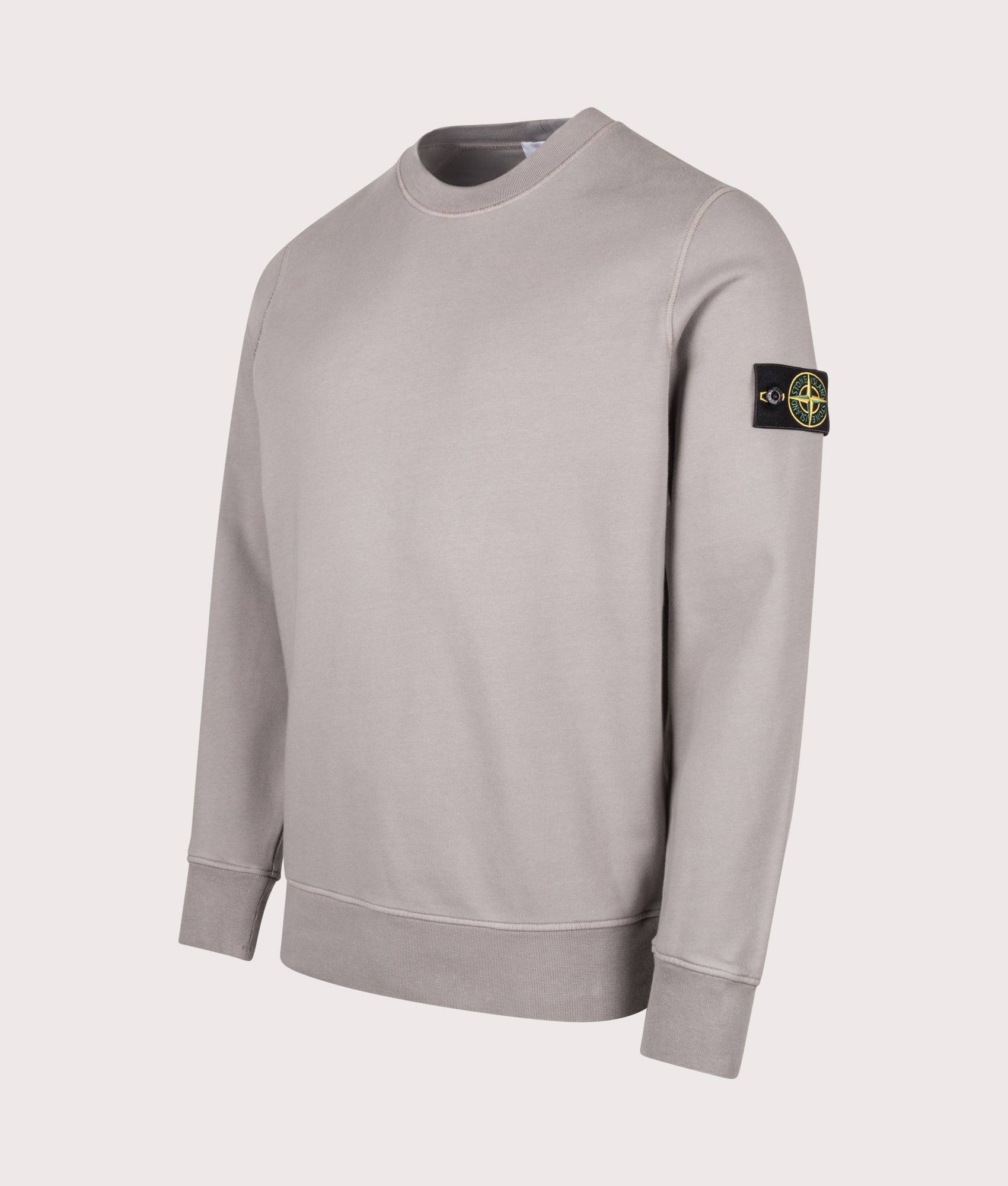 Stone Island Organic Cotton Fleece Sweatshirt in Gray at EQVVS Menswear. Angled front shot.