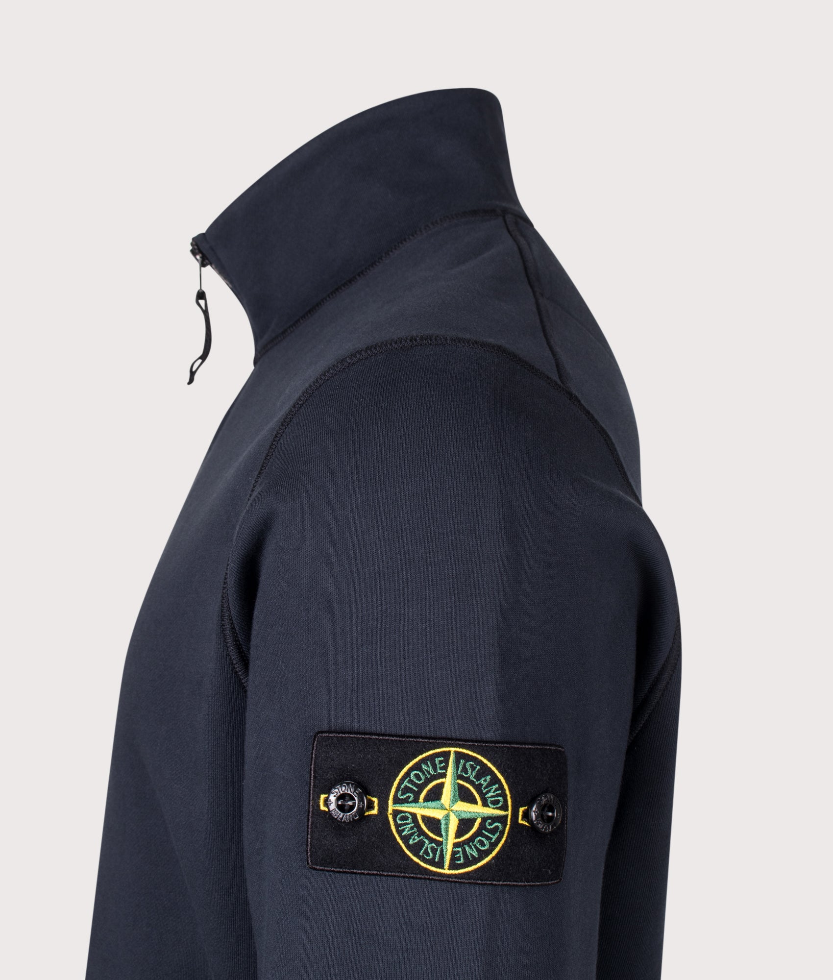 Stone Island Organic Cotton Fleece Quarter Zip Sweatshirt in Navy Blue at EQVVS Menswear. Detail shot.