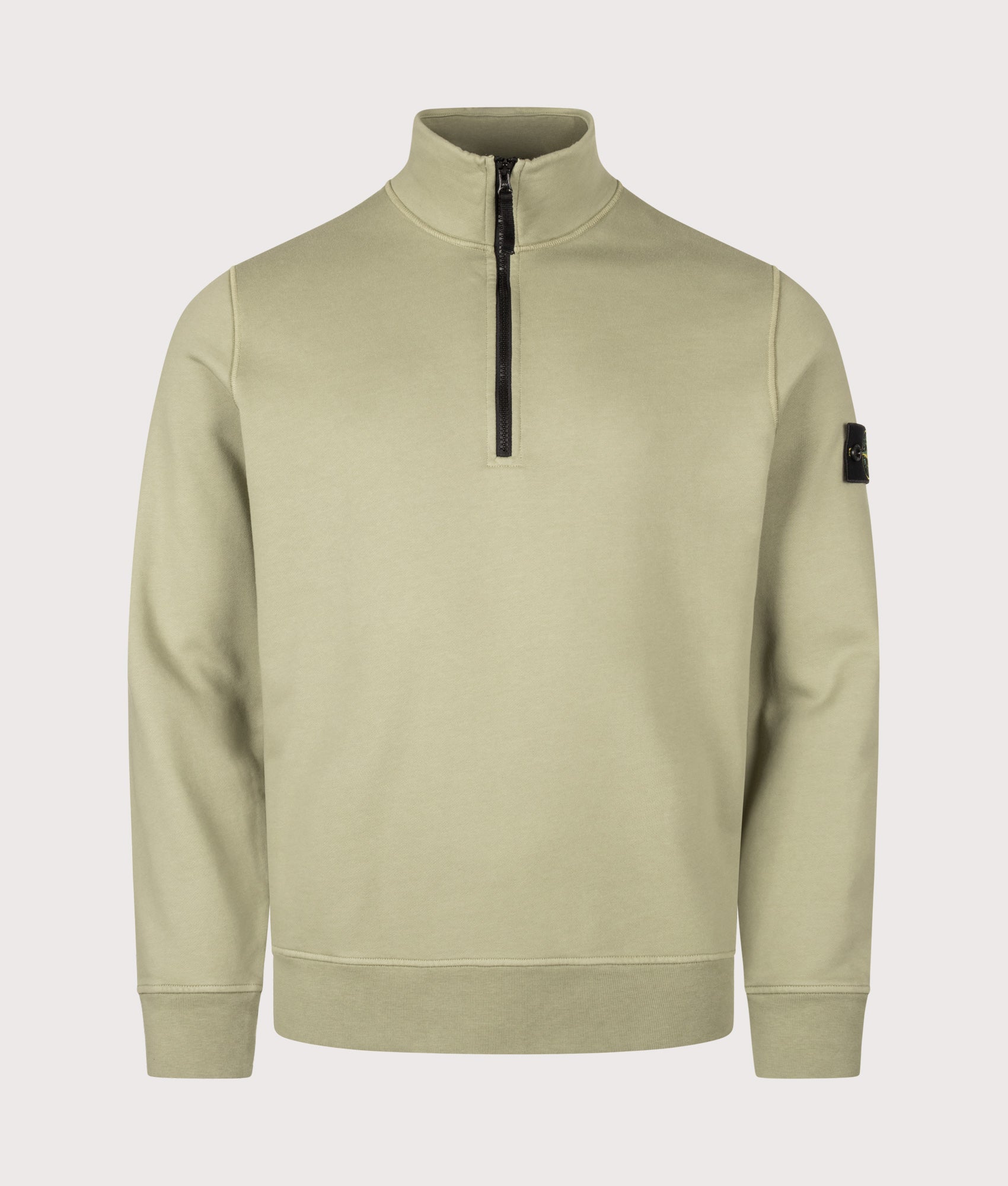 Stone Island Organic Cotton Fleece Quarter Zip Sweatshirt in Laurel Green at EQVVS Menswear. Front shot.
