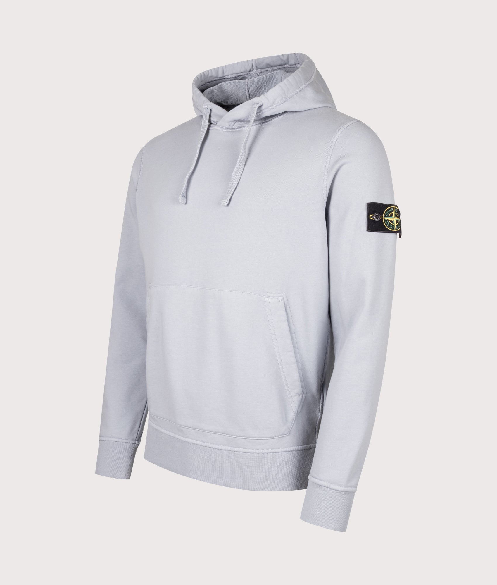 Stone Island Organic Cotton Fleece Hoodie in Ash Grey at EQVVS Menswear. Angled front shot.