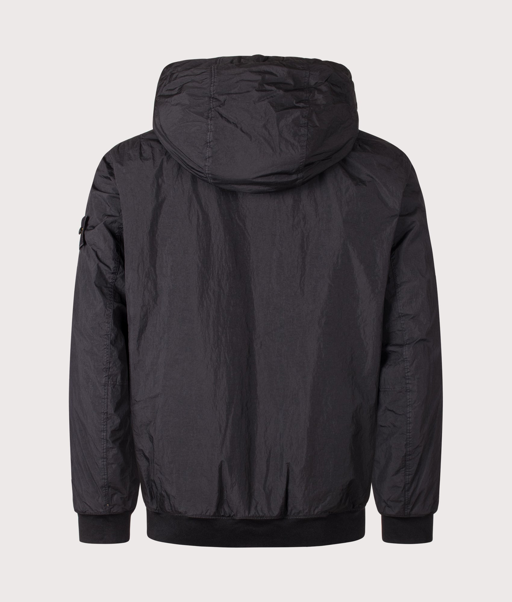 Stone Island Crinkle Reps NY Jacket in Black at EQVVS Menswear. Back shot.