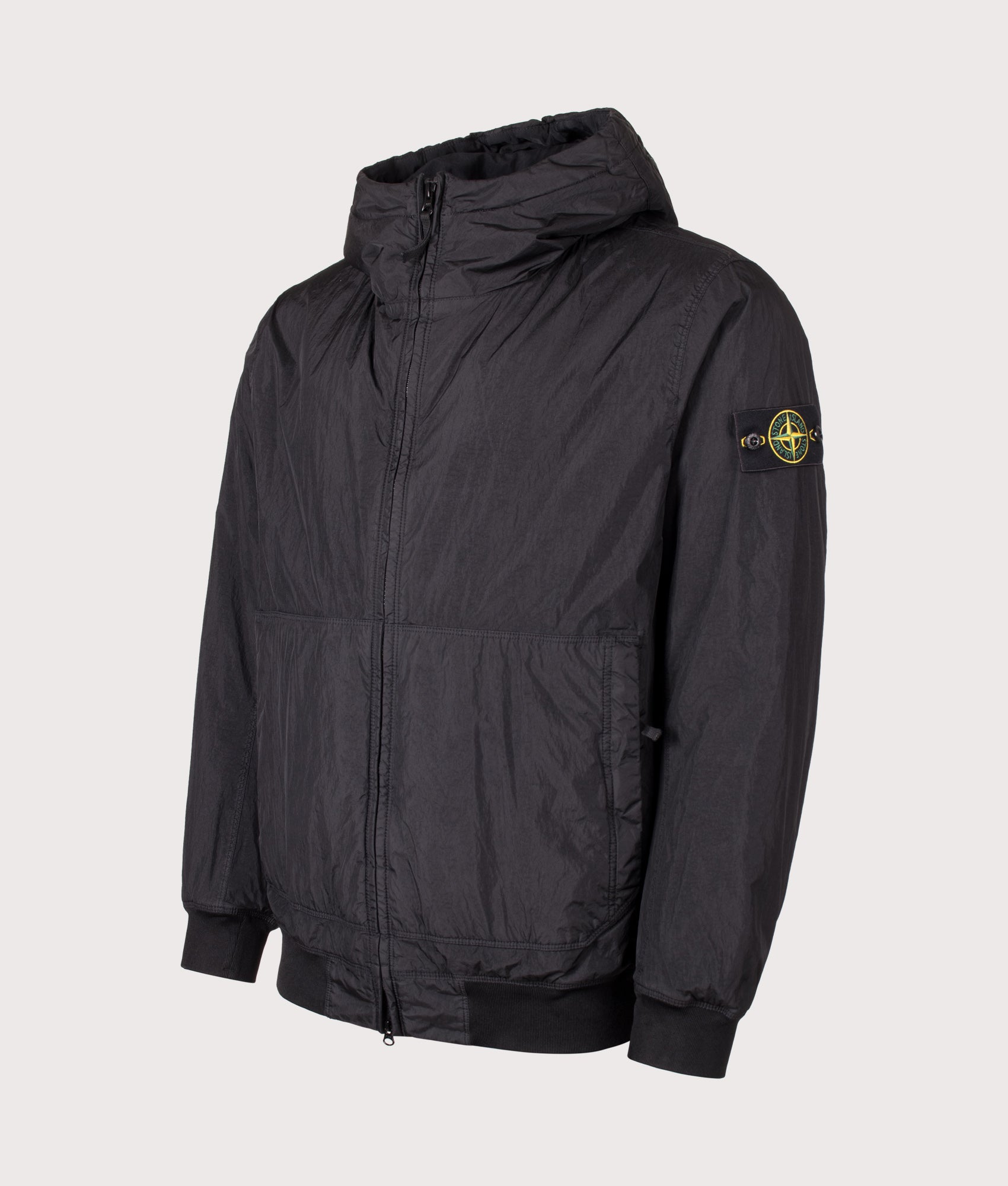 Stone Island Crinkle Reps NY Jacket in Black at EQVVS Menswear. Angled front shot.