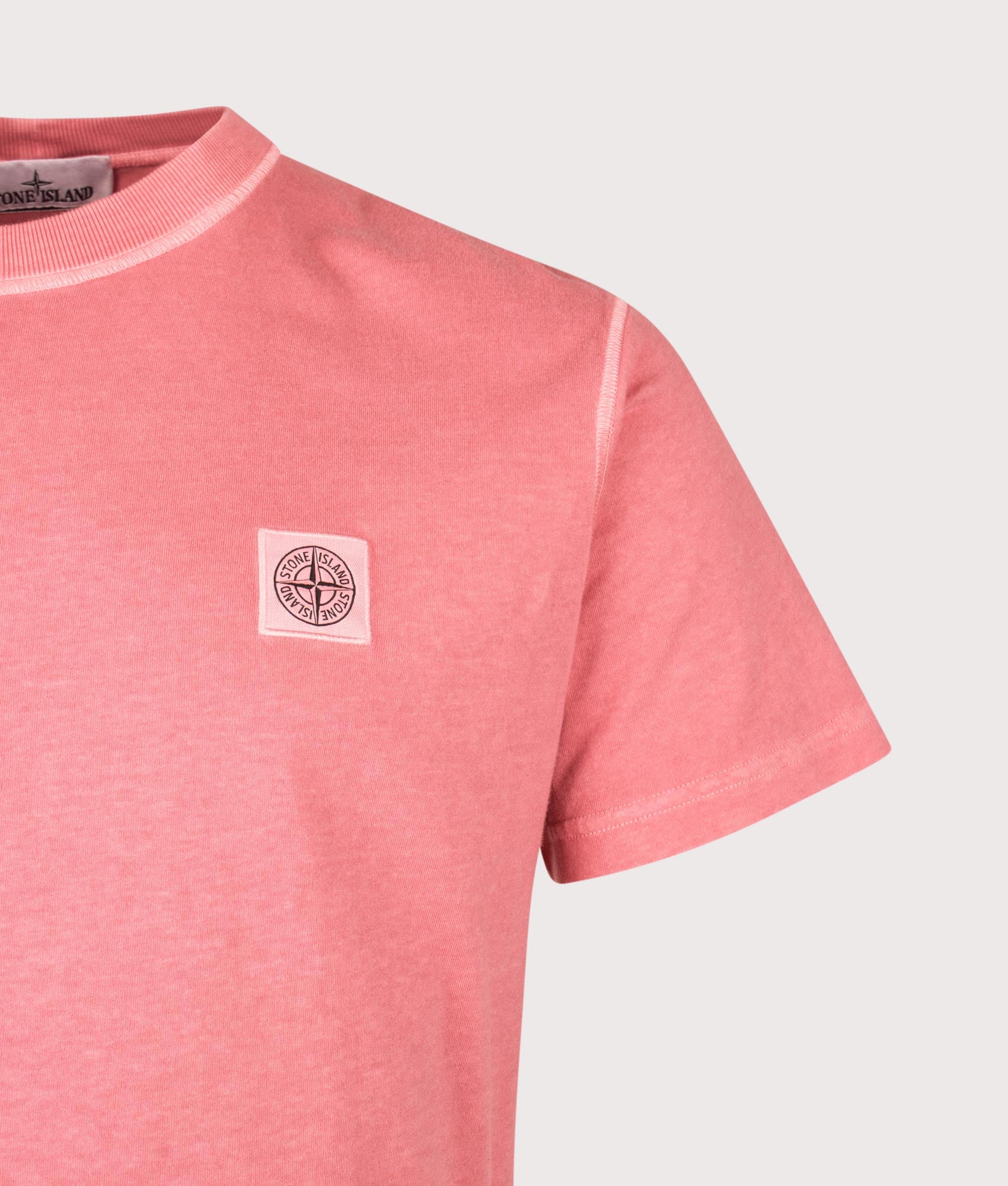 Stone Island Slim Fit Organic Cotton 'FISSATO' Effect T-Shirt in Geranium at EQVVS Menswear. Detail shot.