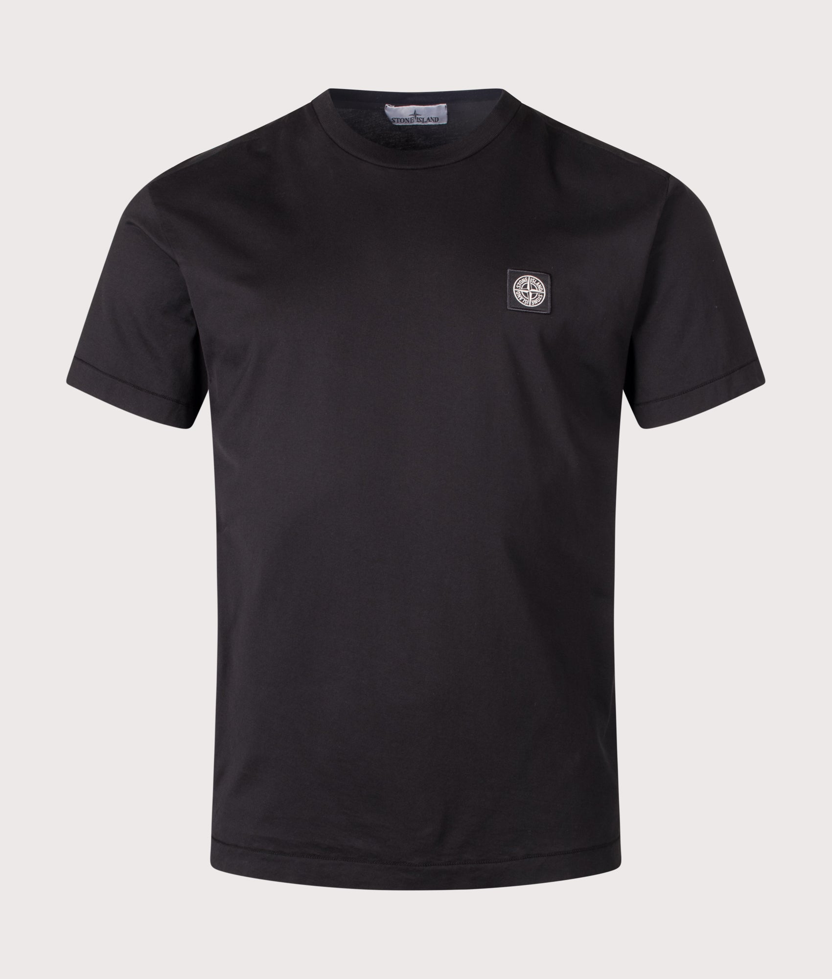 Stone Island Slim Fit 60/2 Cotton Jersey T-Shirt in Black at EQVVS Menswear. Front shot.