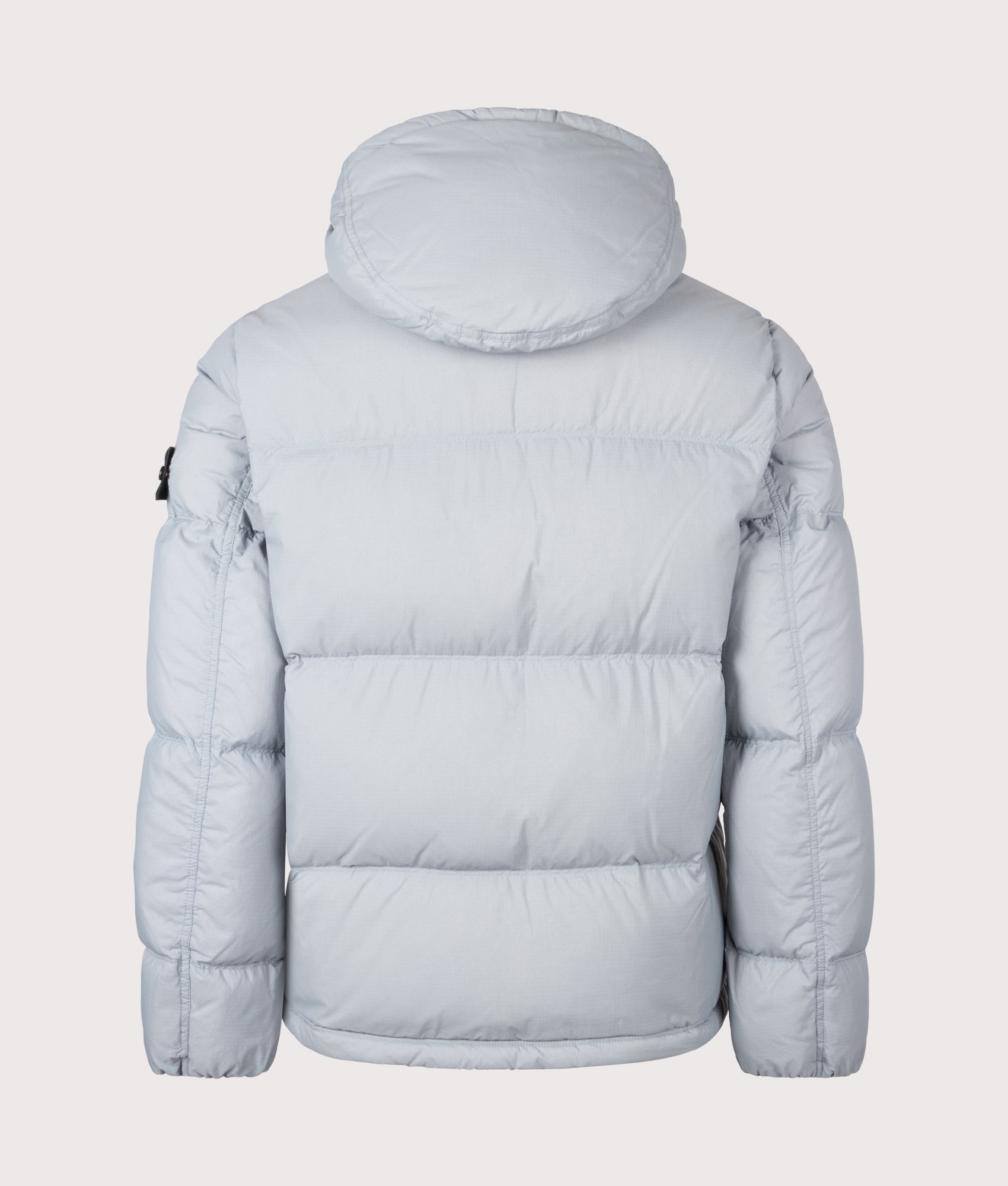 Stone Island Matt Ripstop Cordura® Advanced Fabrics Puffer Jacket in Ash Grey at EQVVS Menswear. Back shot.