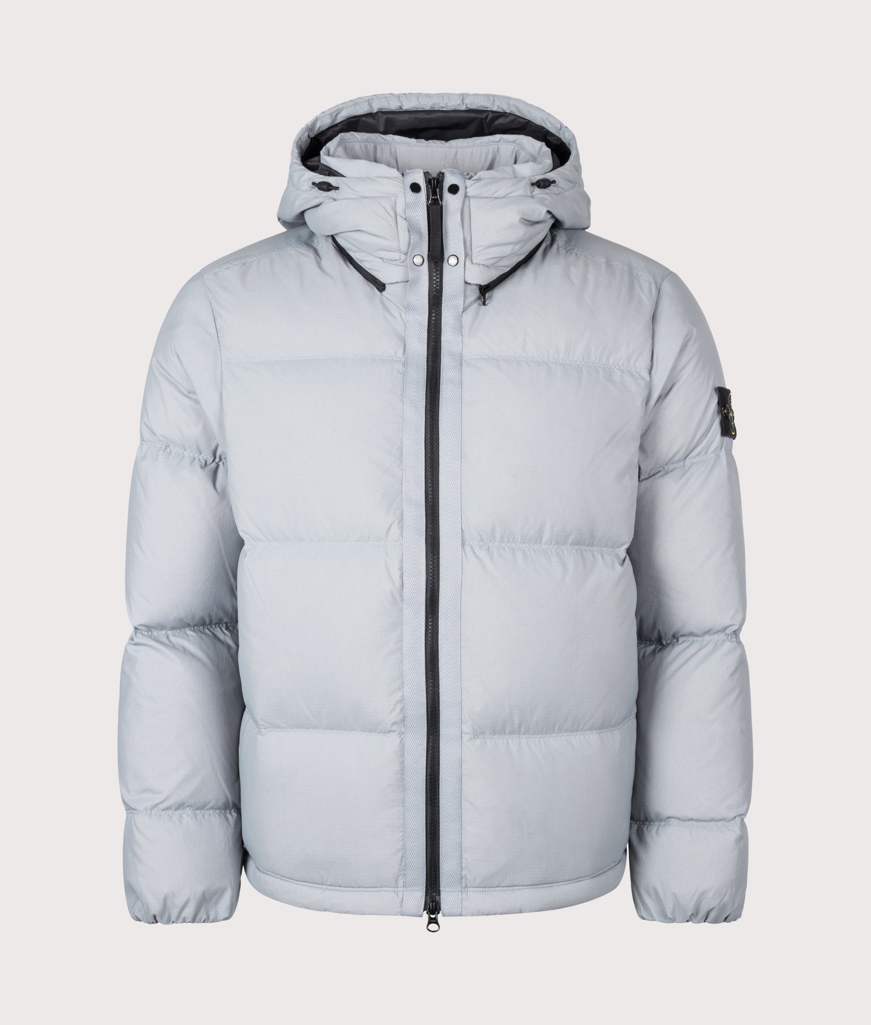 Stone Island Matt Ripstop Cordura® Advanced Fabrics Puffer Jacket in Ash Grey at EQVVS Menswear. Front shot.