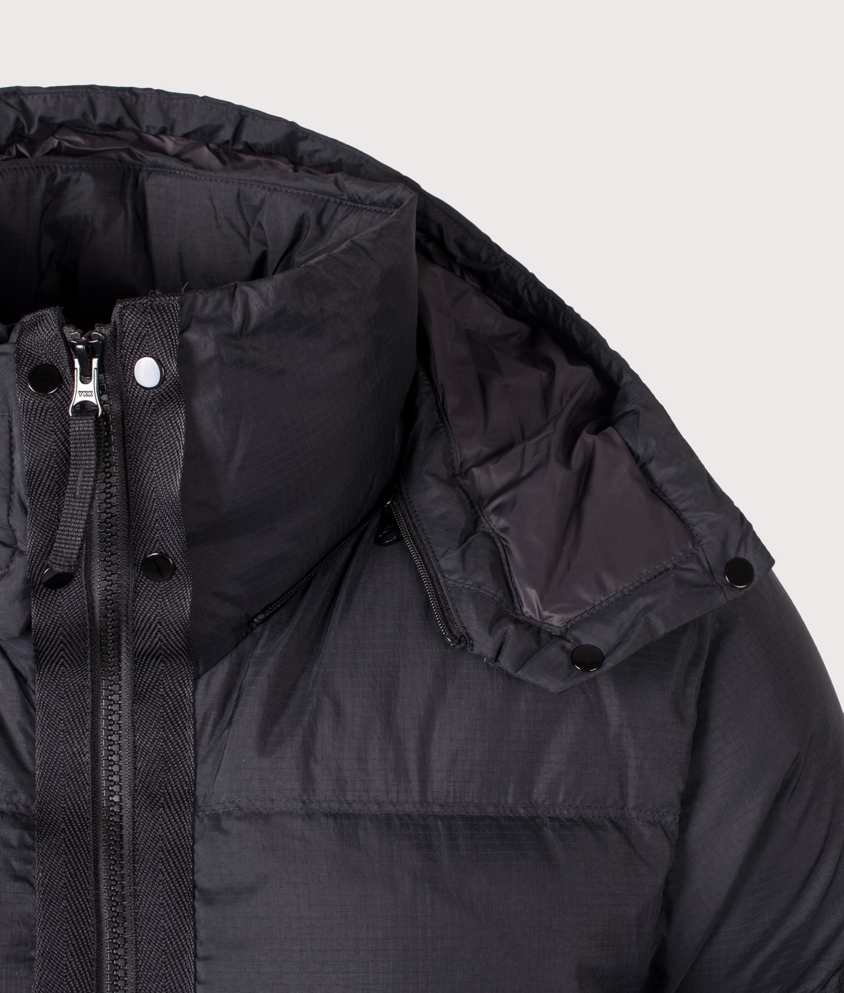 Stone Island Matt Ripstop Cordura® Advanced Fabrics Puffer Jacket in Black at EQVVS Menswear. Hood detail shot.