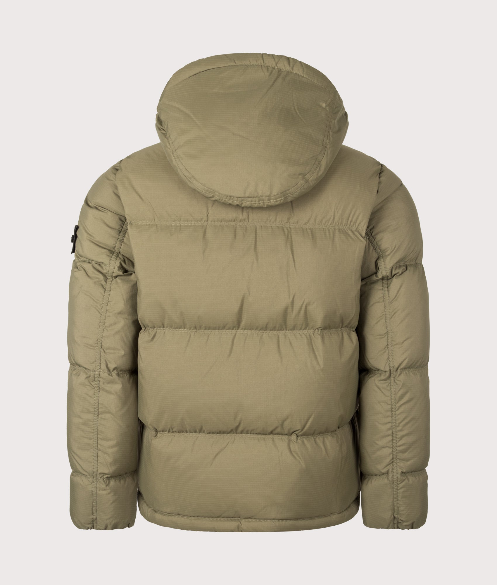 Stone Island Matt Ripstop Cordura® Advanced Fabrics Puffer Jacket in Military Green at EQVVS Menswear. Back shot.