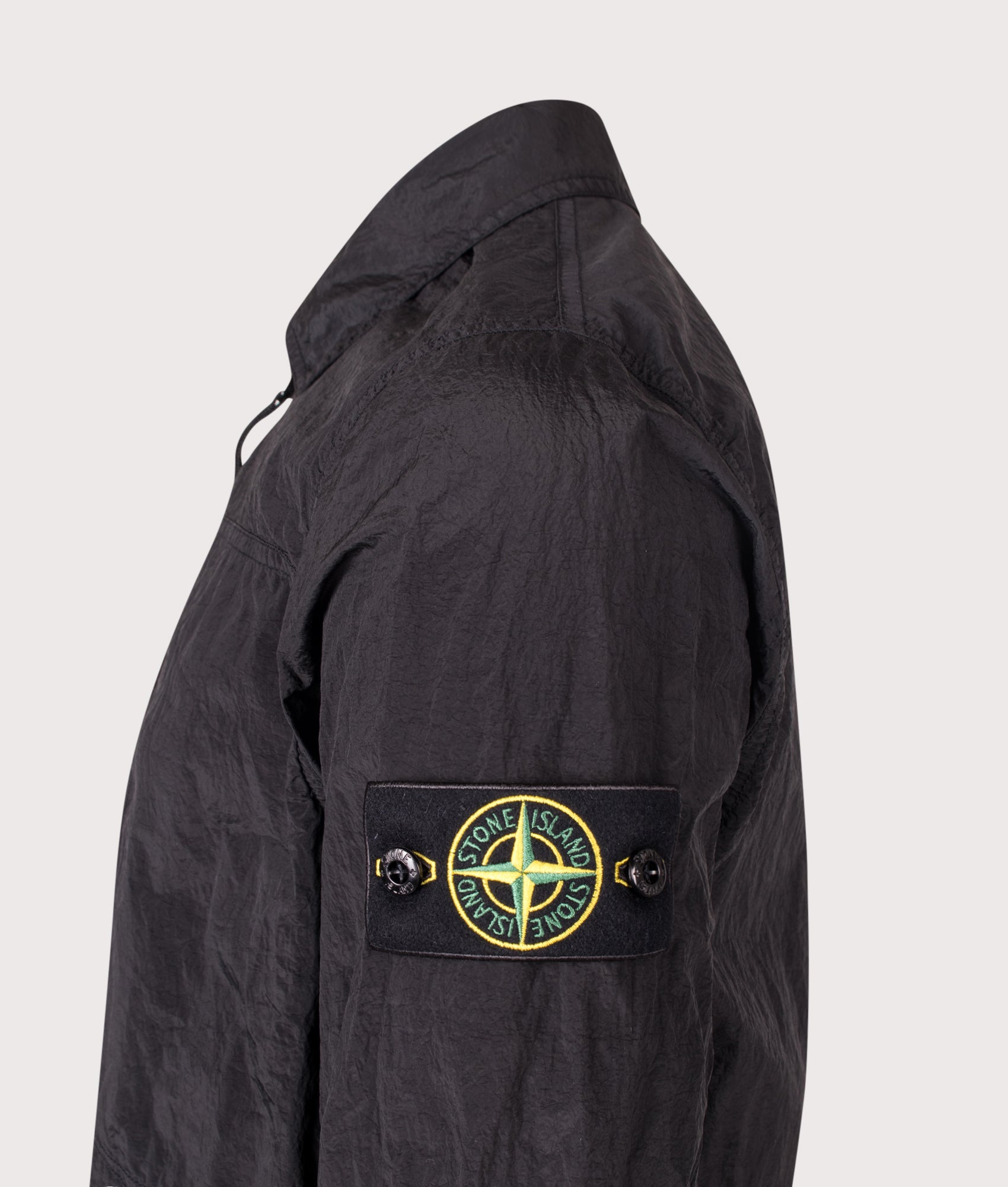 Stone Island Nylon Metal in Econyl® Overshirt in Black at EQVVS Menswear. Detail shot.